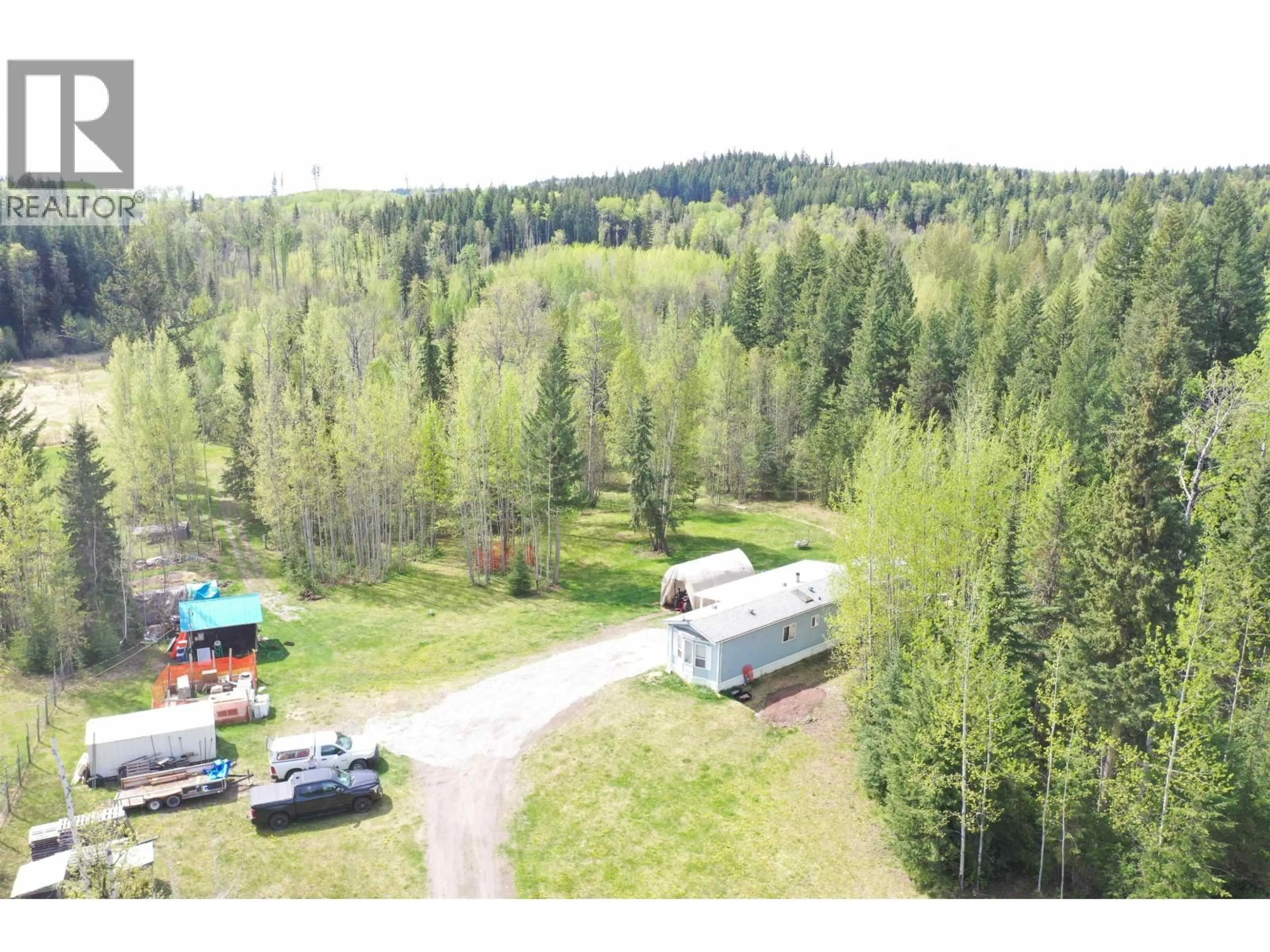 A pic from outside/outdoor area/front of a property/back of a property/a pic from drone, forest/trees view for 2817 NAZKO ROAD, Quesnel British Columbia V2J7E5
