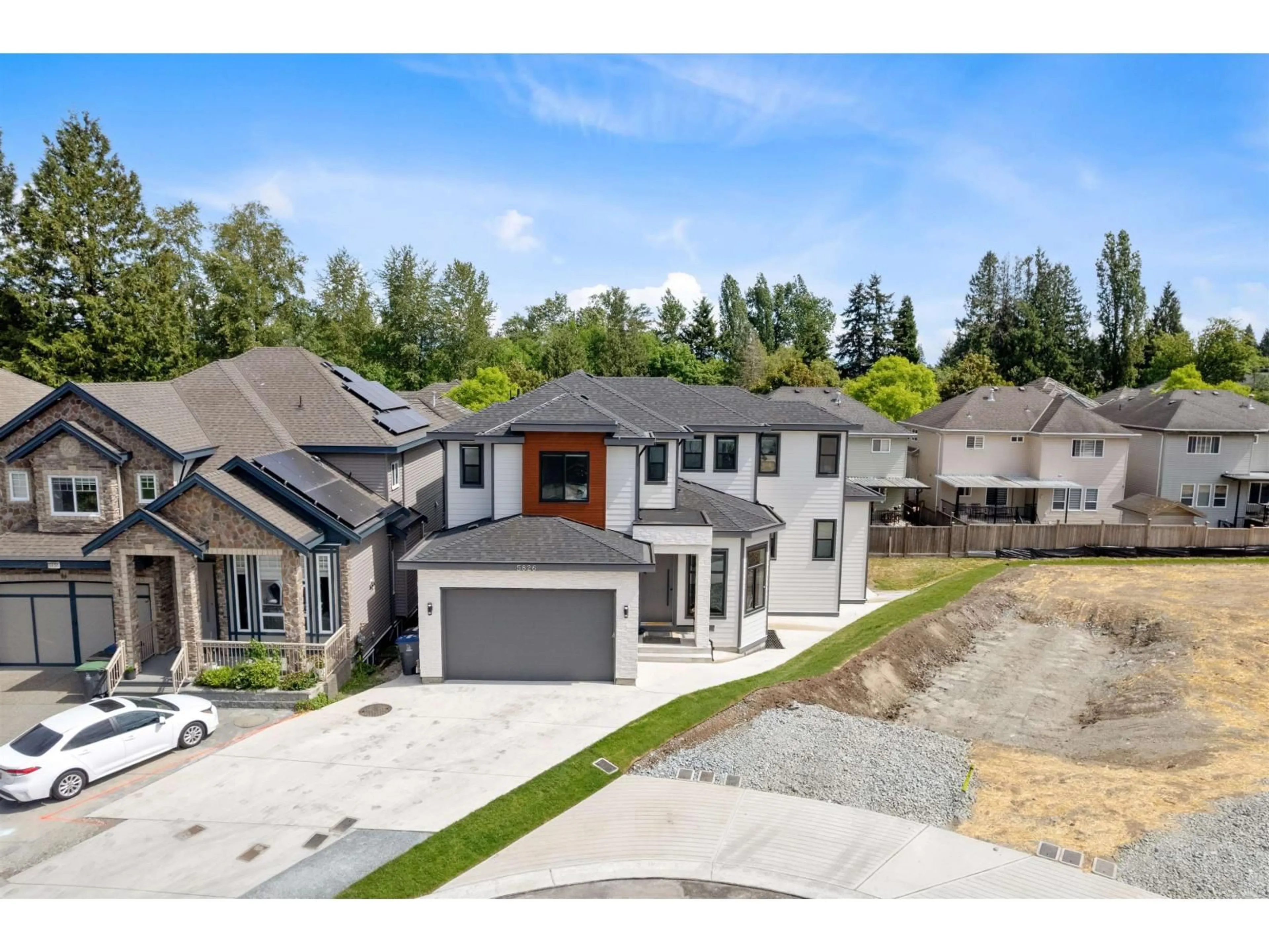 A pic from outside/outdoor area/front of a property/back of a property/a pic from drone, street for 5826 138 STREET, Surrey British Columbia V3X0C9