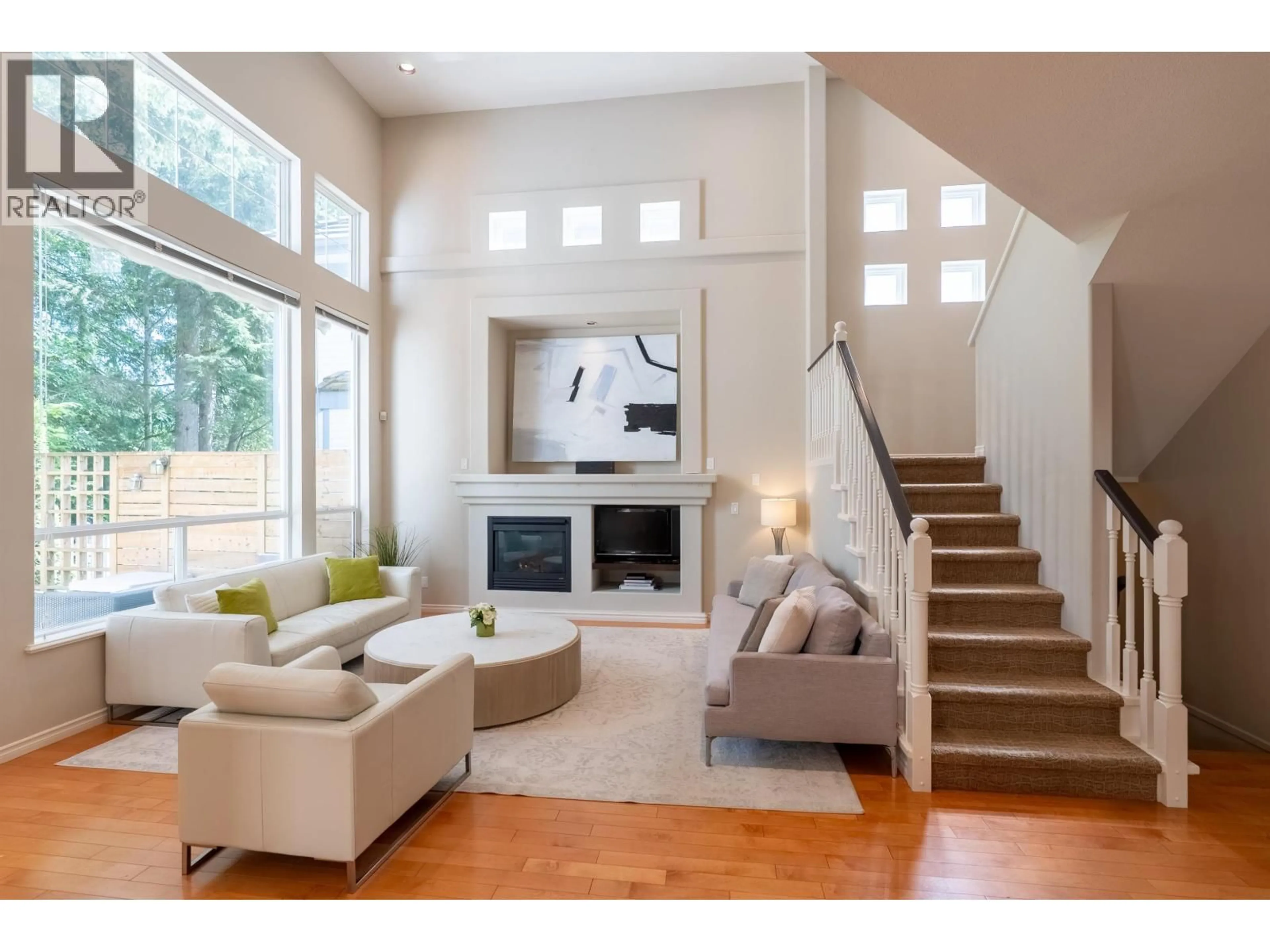 Living room with furniture, wood/laminate floor for 3303 CHARTWELL, Coquitlam British Columbia V3E3N1