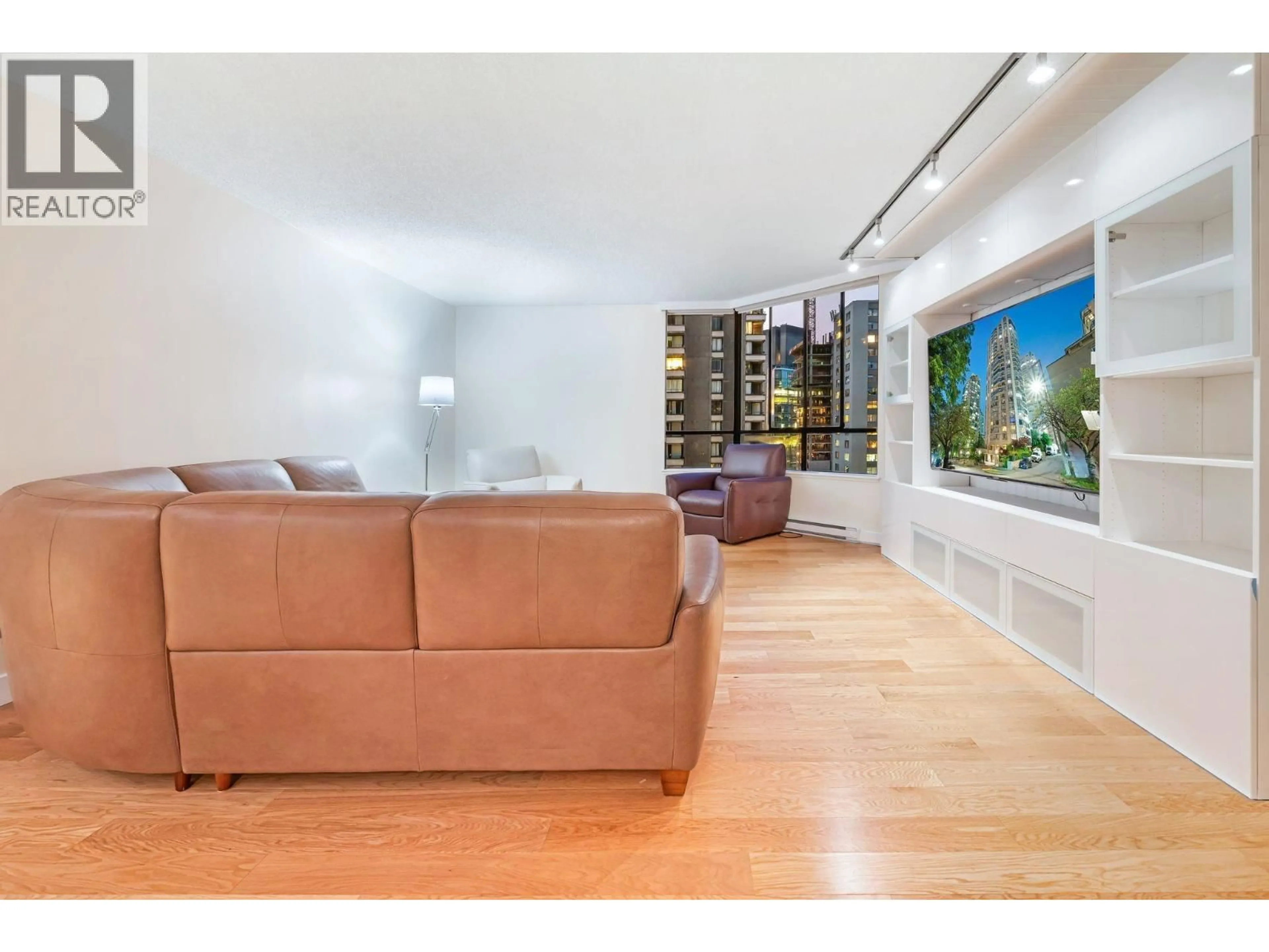 Living room with furniture, wood/laminate floor for 601 - 738 BROUGHTON STREET, Vancouver British Columbia V6G3A7