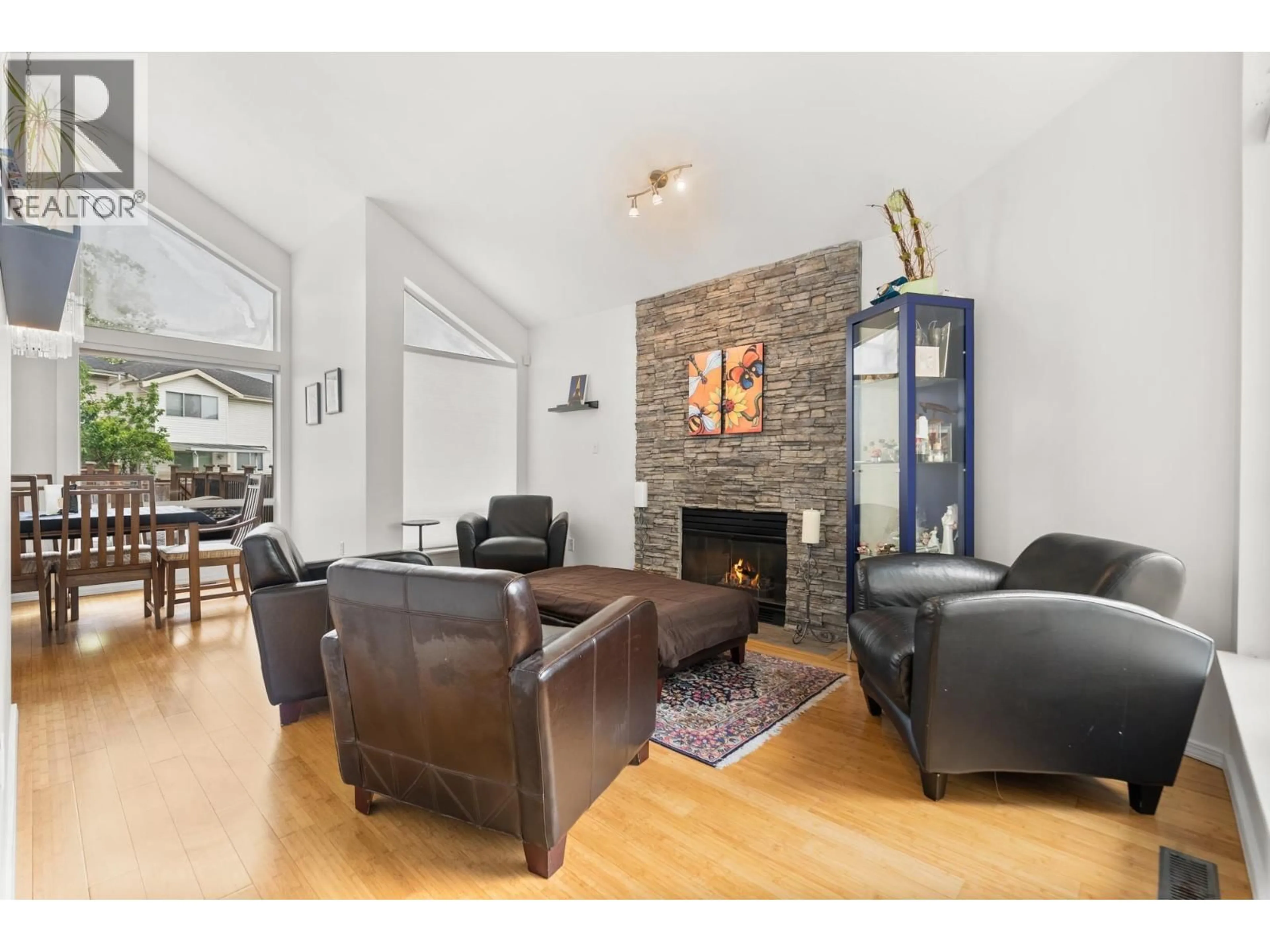 Living room with furniture, wood/laminate floor for 22191 GARRATT DRIVE, Richmond British Columbia V6V2P4