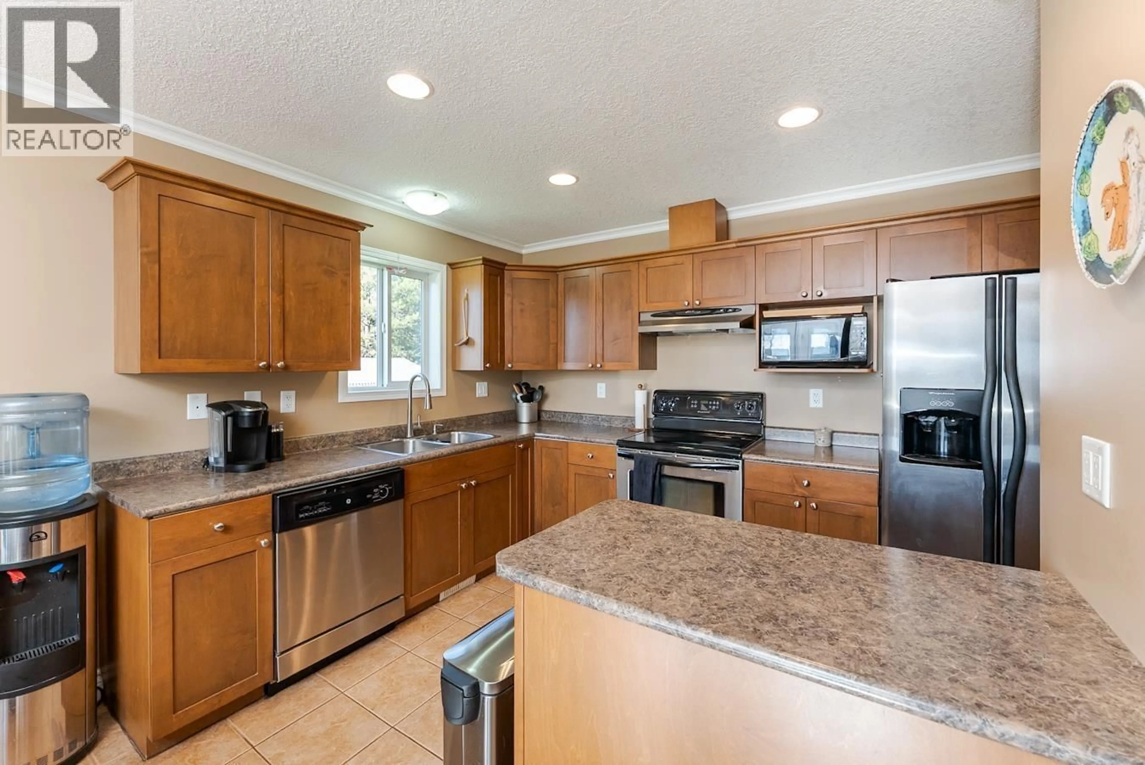 Standard kitchen, ceramic/tile floor for 8385 MURALT ROAD, Prince George British Columbia V2N6H1