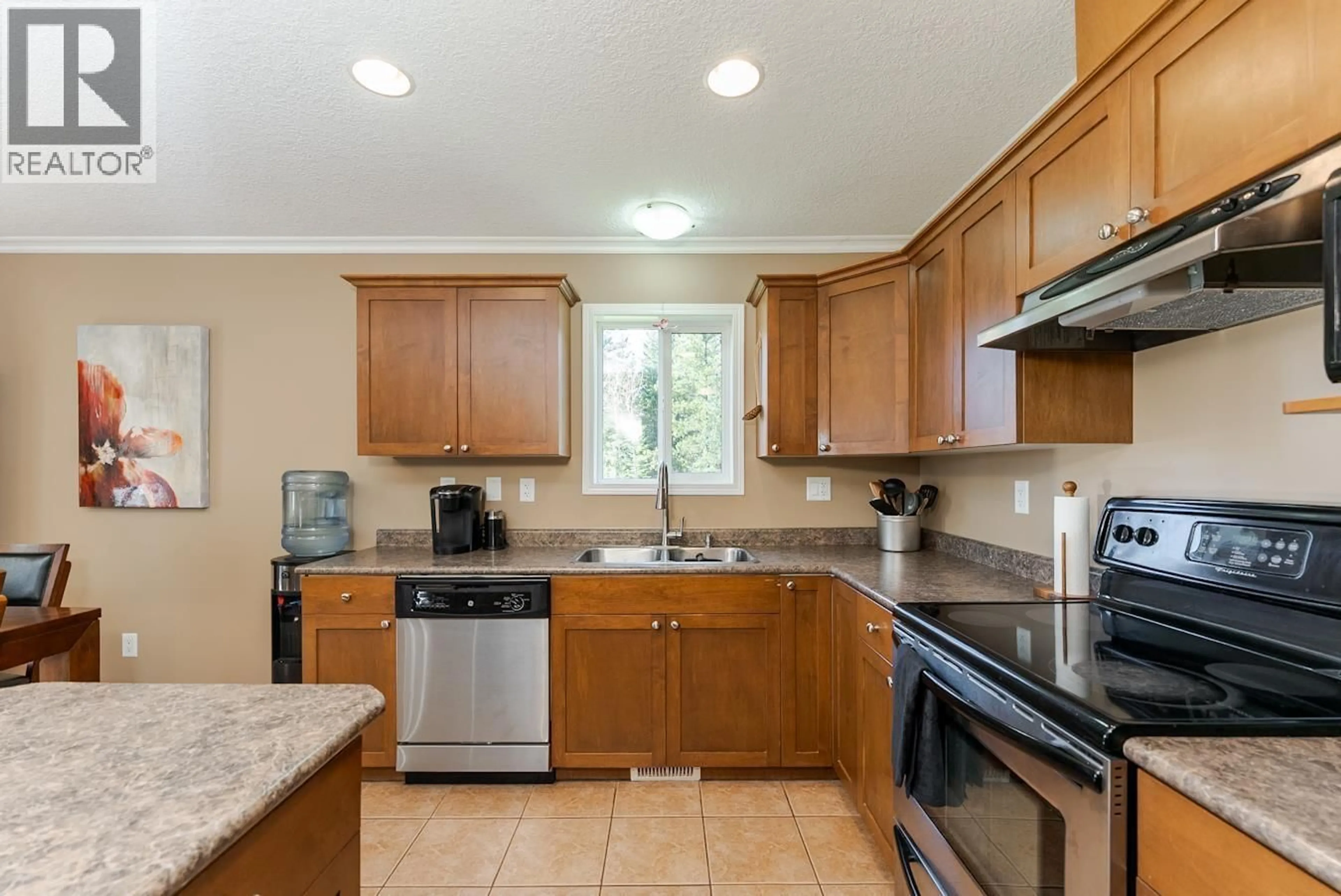 Standard kitchen, ceramic/tile floor for 8385 MURALT ROAD, Prince George British Columbia V2N6H1