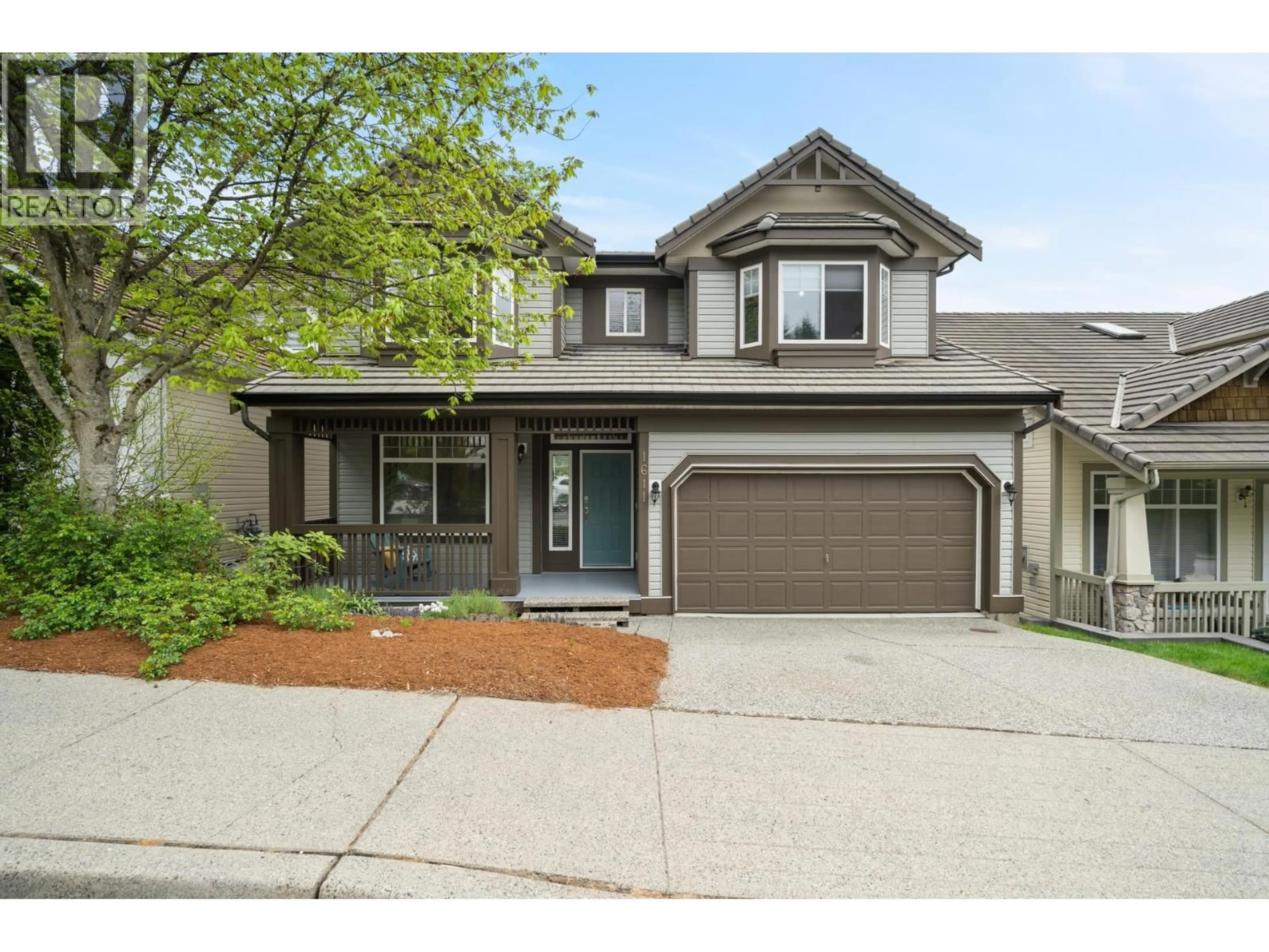 Home with vinyl exterior material, street for 1611 STONERIDGE LANE, Coquitlam British Columbia V3E3K9