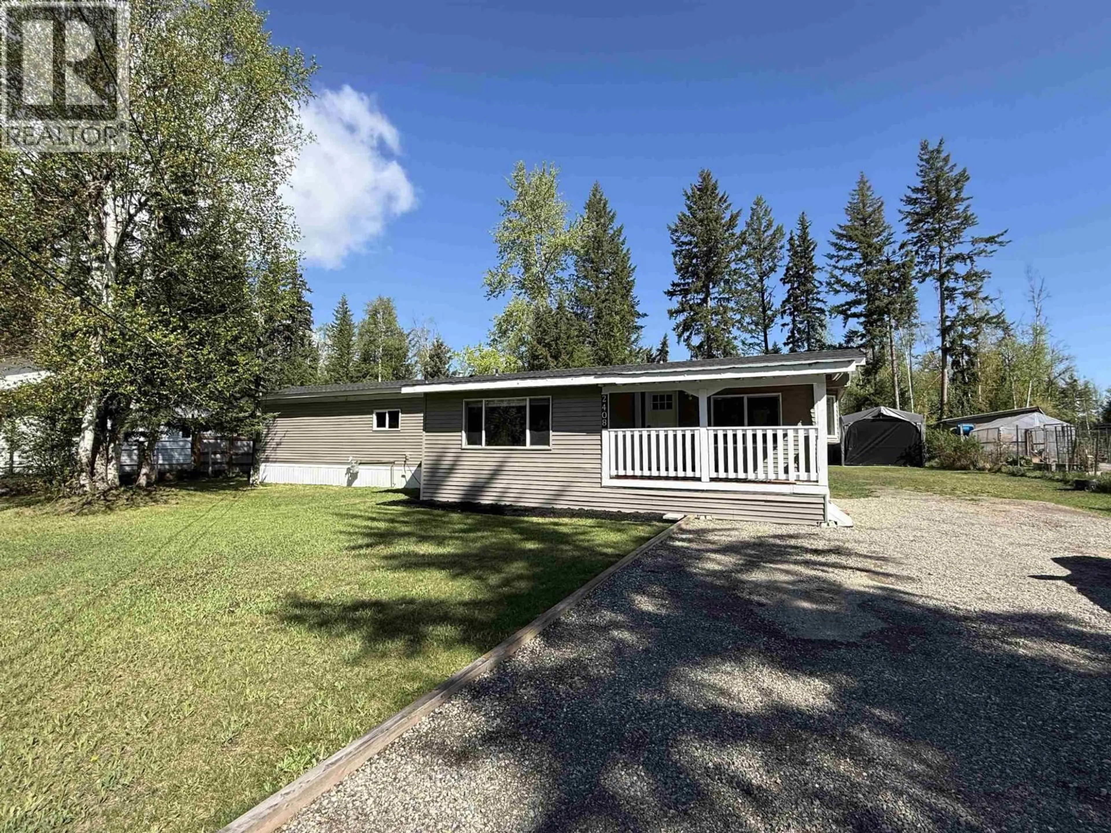 A pic from outside/outdoor area/front of a property/back of a property/a pic from drone, street for 2408 TANOKA ROAD, Quesnel British Columbia V2J7B8
