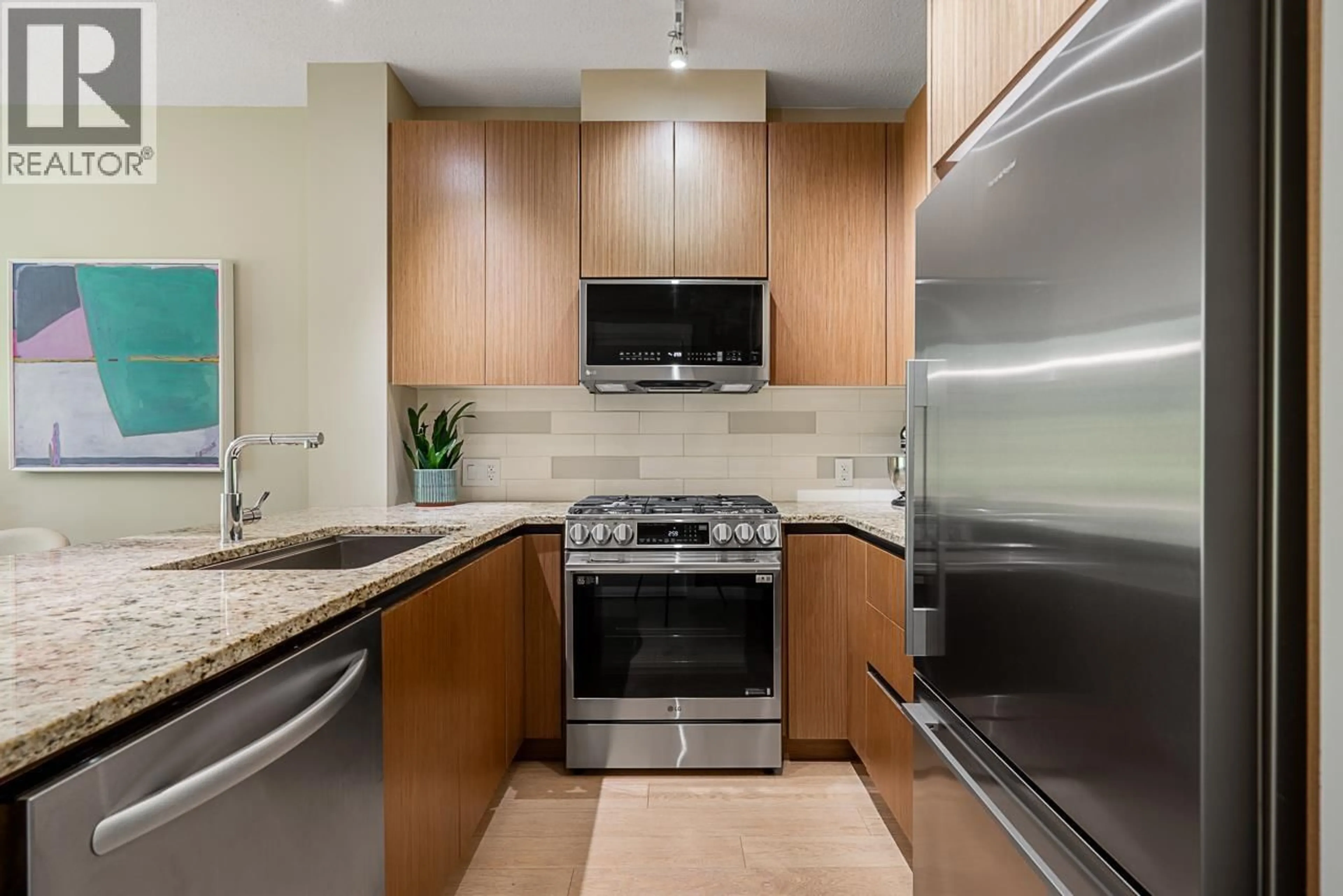 Standard kitchen, ceramic/tile floor for 202 - 135 2ND STREET, North Vancouver British Columbia V7M0C5