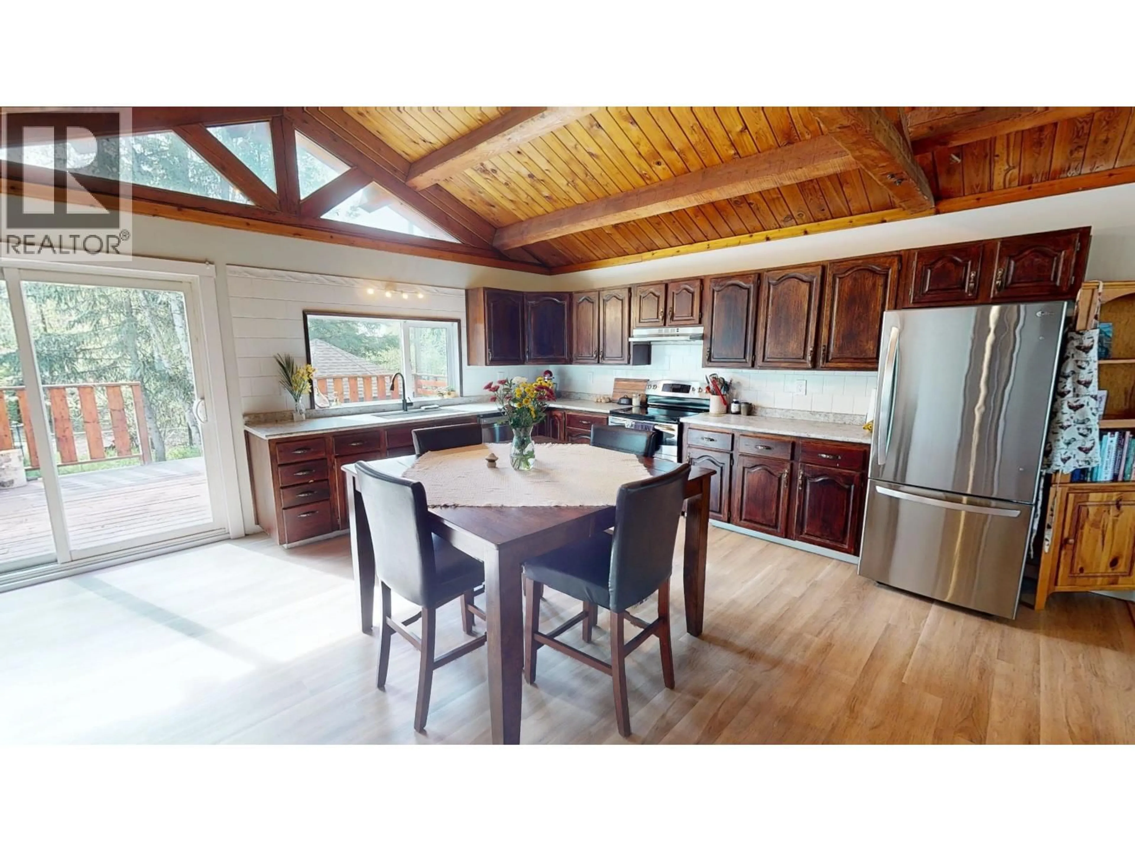 Open concept kitchen, wood/laminate floor for 2341 REIERSON ROAD, Quesnel British Columbia V2J6K1