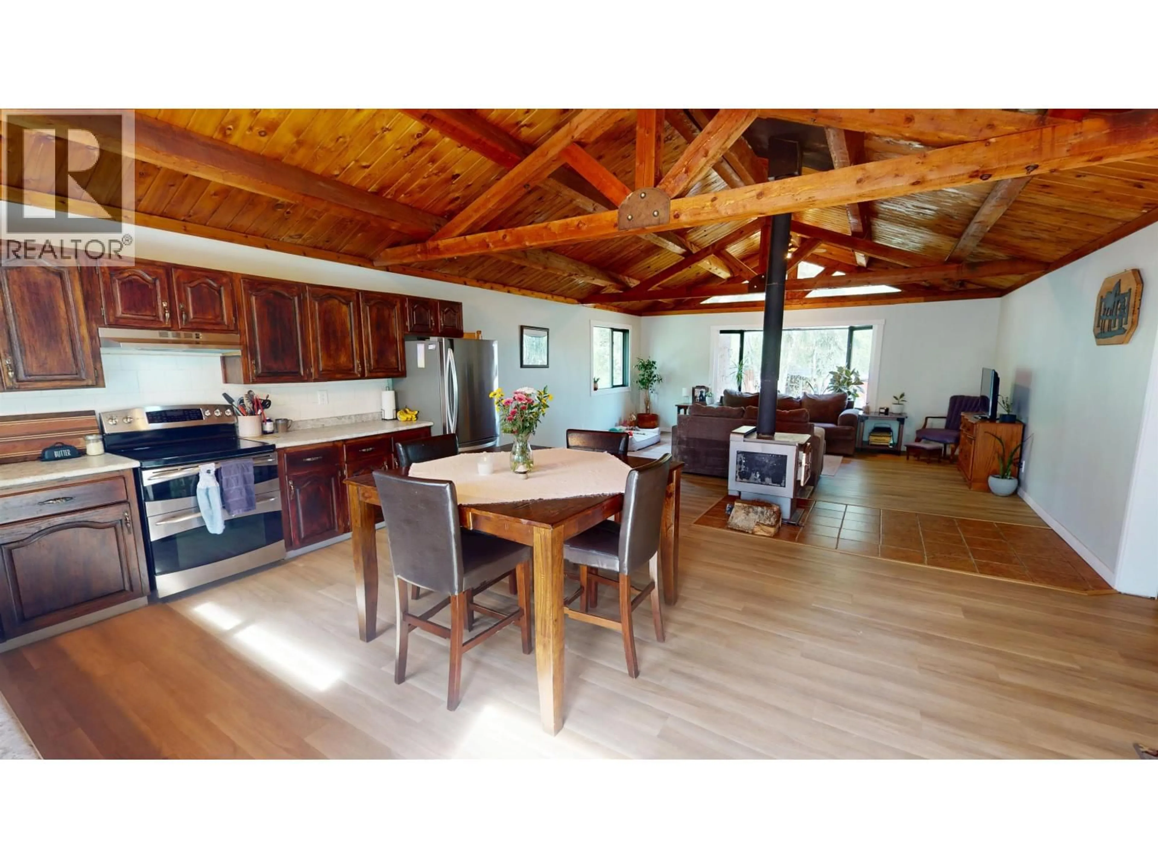 Open concept kitchen, wood/laminate floor for 2341 REIERSON ROAD, Quesnel British Columbia V2J6K1