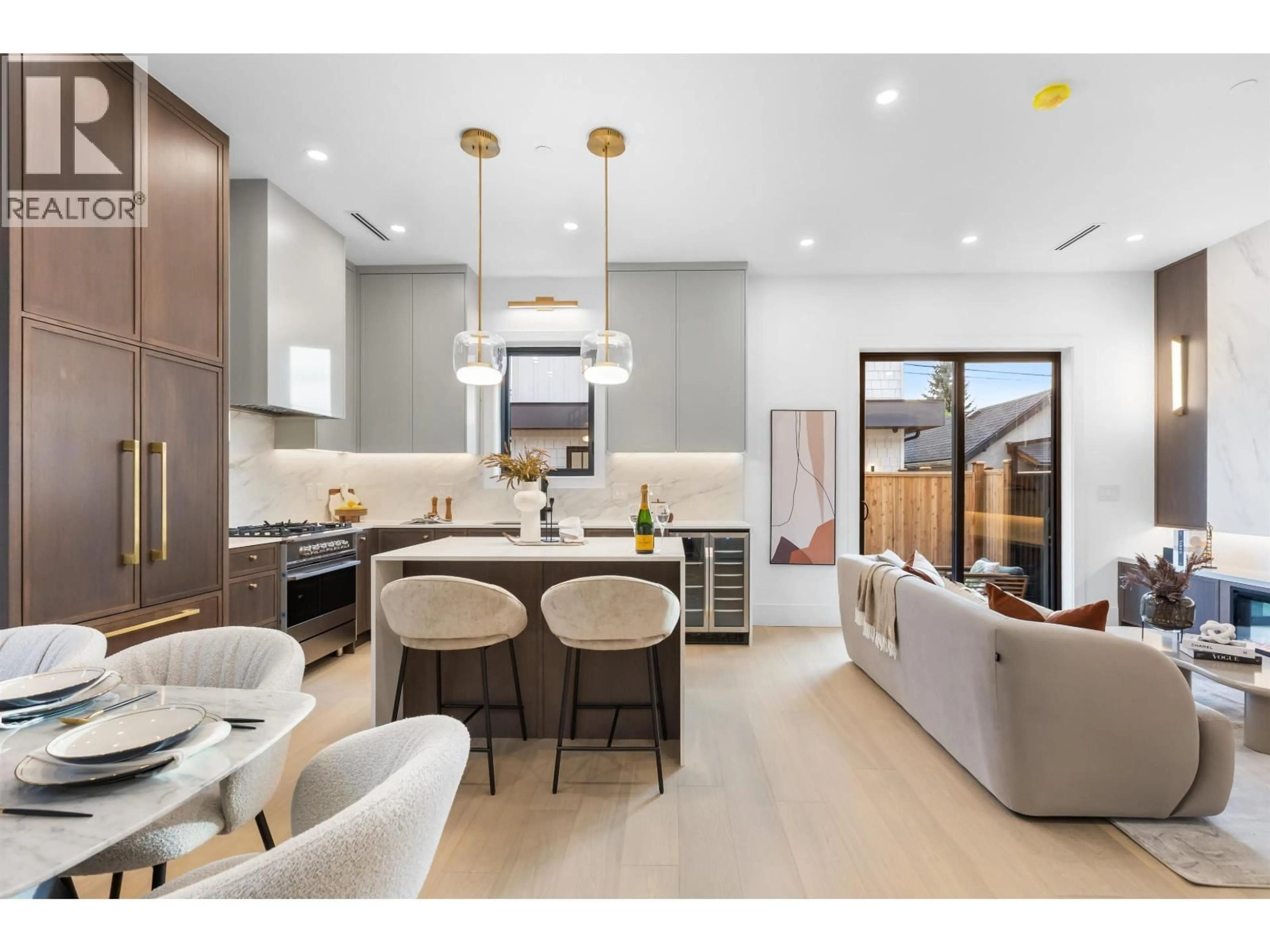 Open concept kitchen, wood/laminate floor for 2 - 546 46TH AVENUE, Vancouver British Columbia V5W2A3