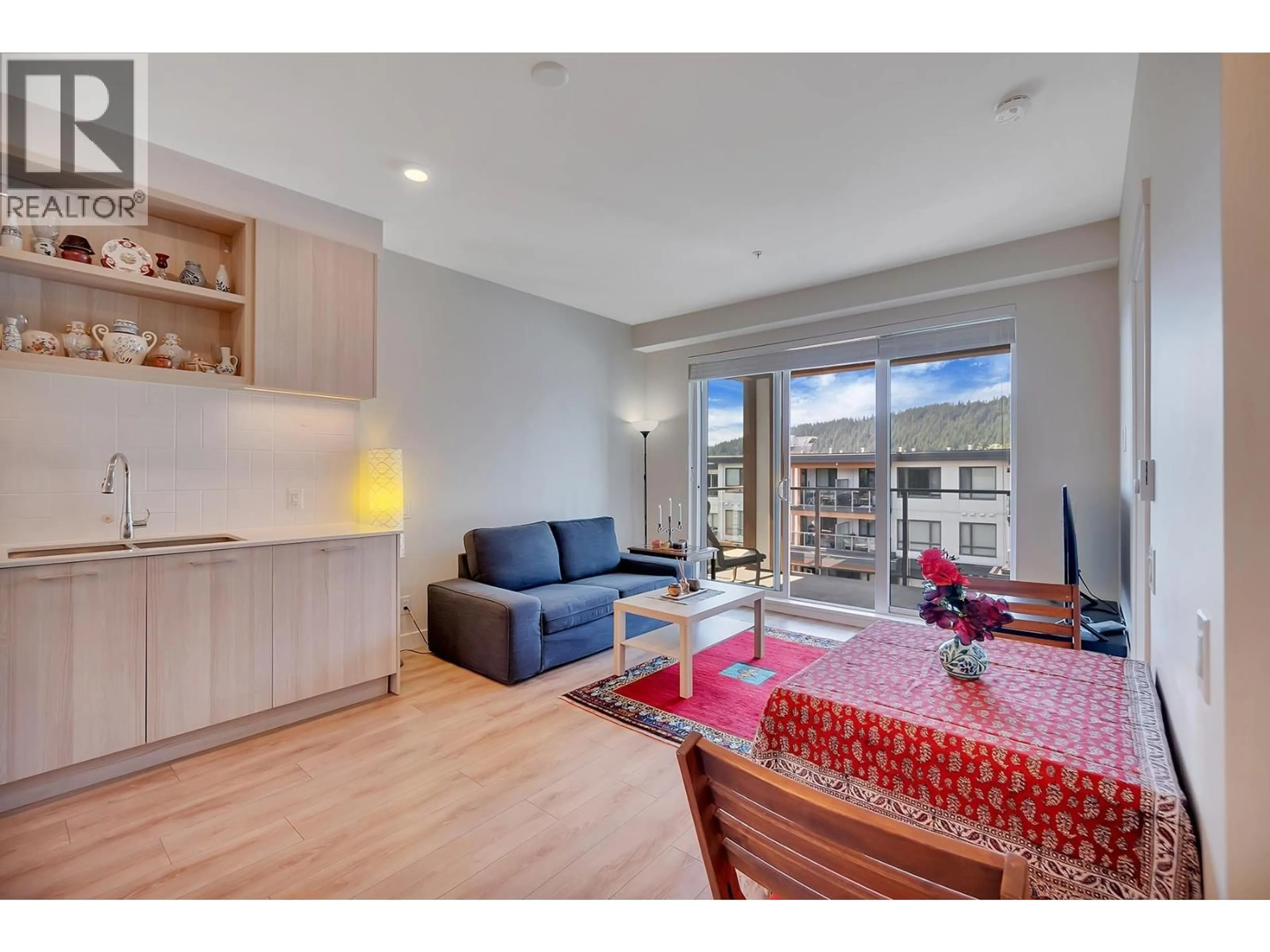 Living room with furniture, wood/laminate floor for 620 - 721 ANSKAR COURT, Port Coquitlam British Columbia V3J0L4