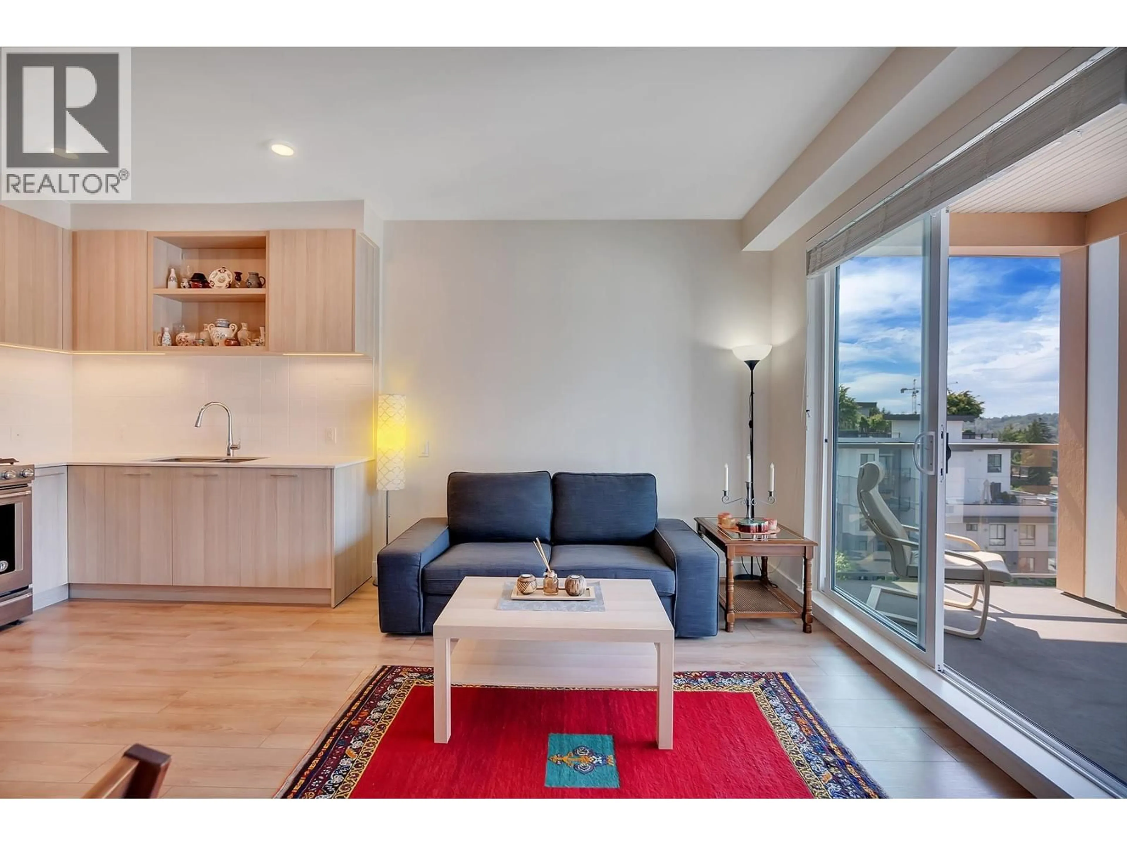 Living room with furniture, wood/laminate floor for 620 - 721 ANSKAR COURT, Port Coquitlam British Columbia V3J0L4