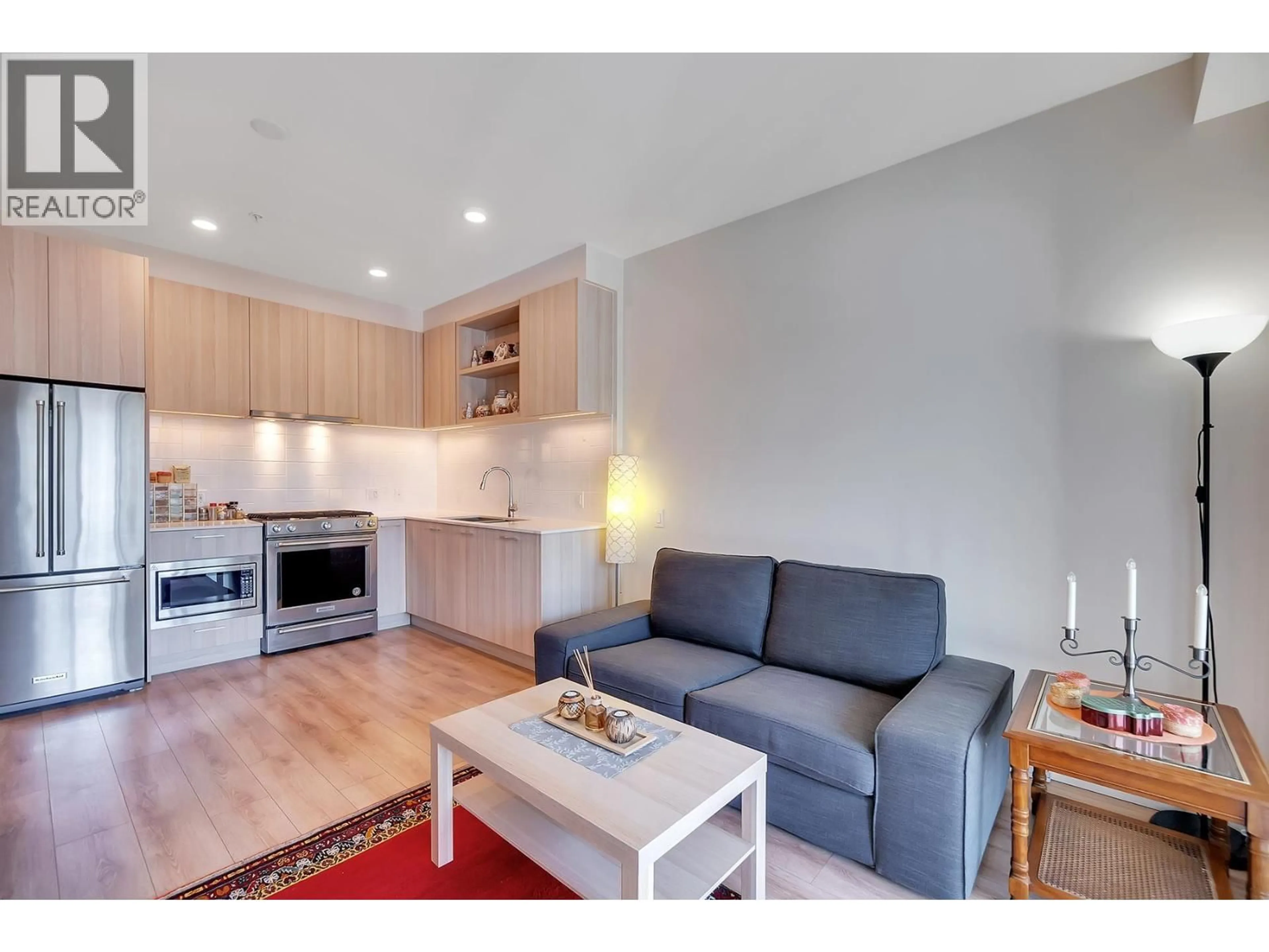 Living room with furniture, wood/laminate floor for 620 - 721 ANSKAR COURT, Port Coquitlam British Columbia V3J0L4