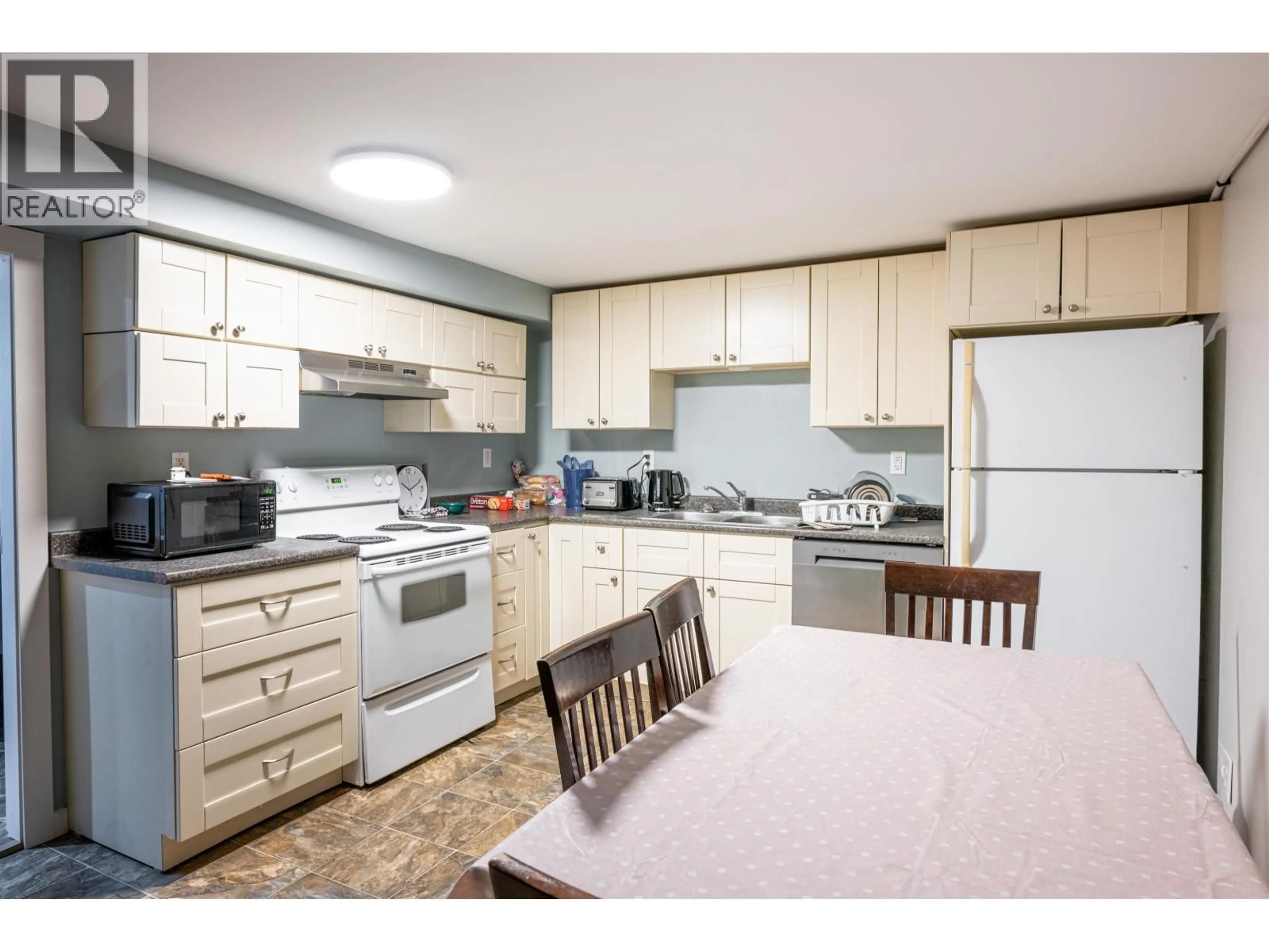 Standard kitchen, wood/laminate floor for 585 GILLETT STREET, Prince George British Columbia V2M2T8