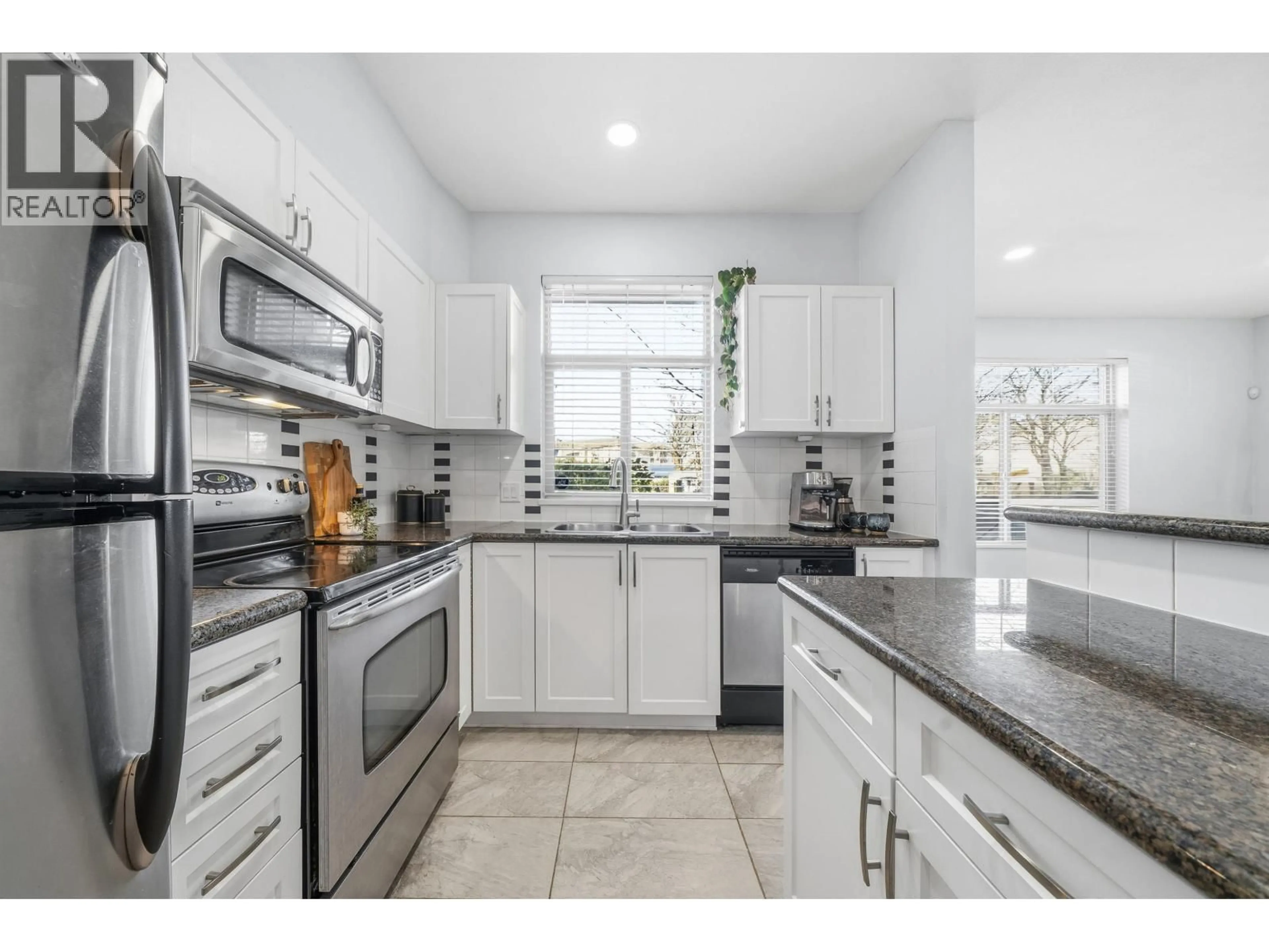 Open concept kitchen, ceramic/tile floor for 112 - 2330 WILSON AVENUE, Port Coquitlam British Columbia V3C1Z6