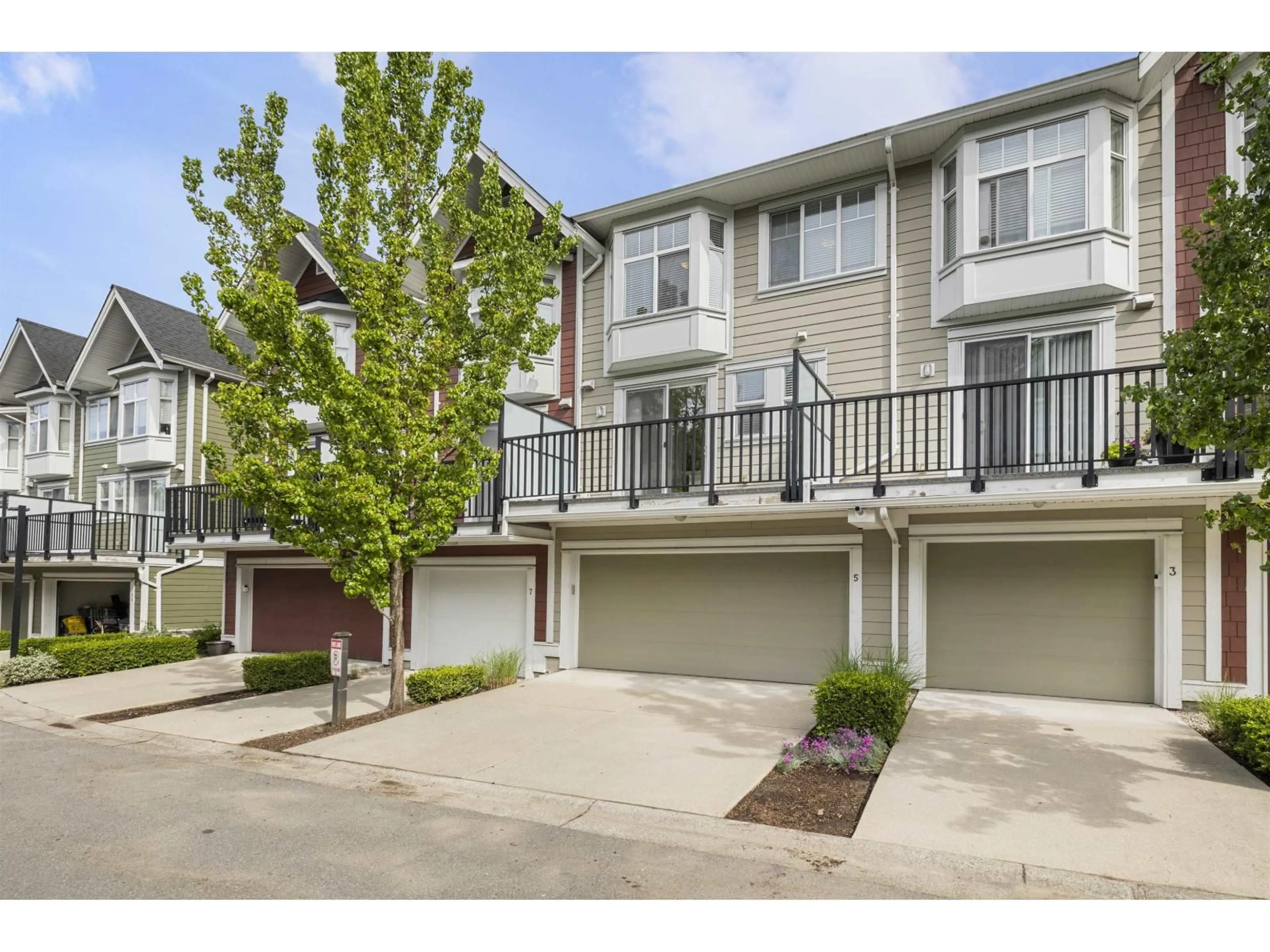 A pic from outside/outdoor area/front of a property/back of a property/a pic from drone, street for 5 - 20852 77A AVENUE, Langley British Columbia V2Y0R8