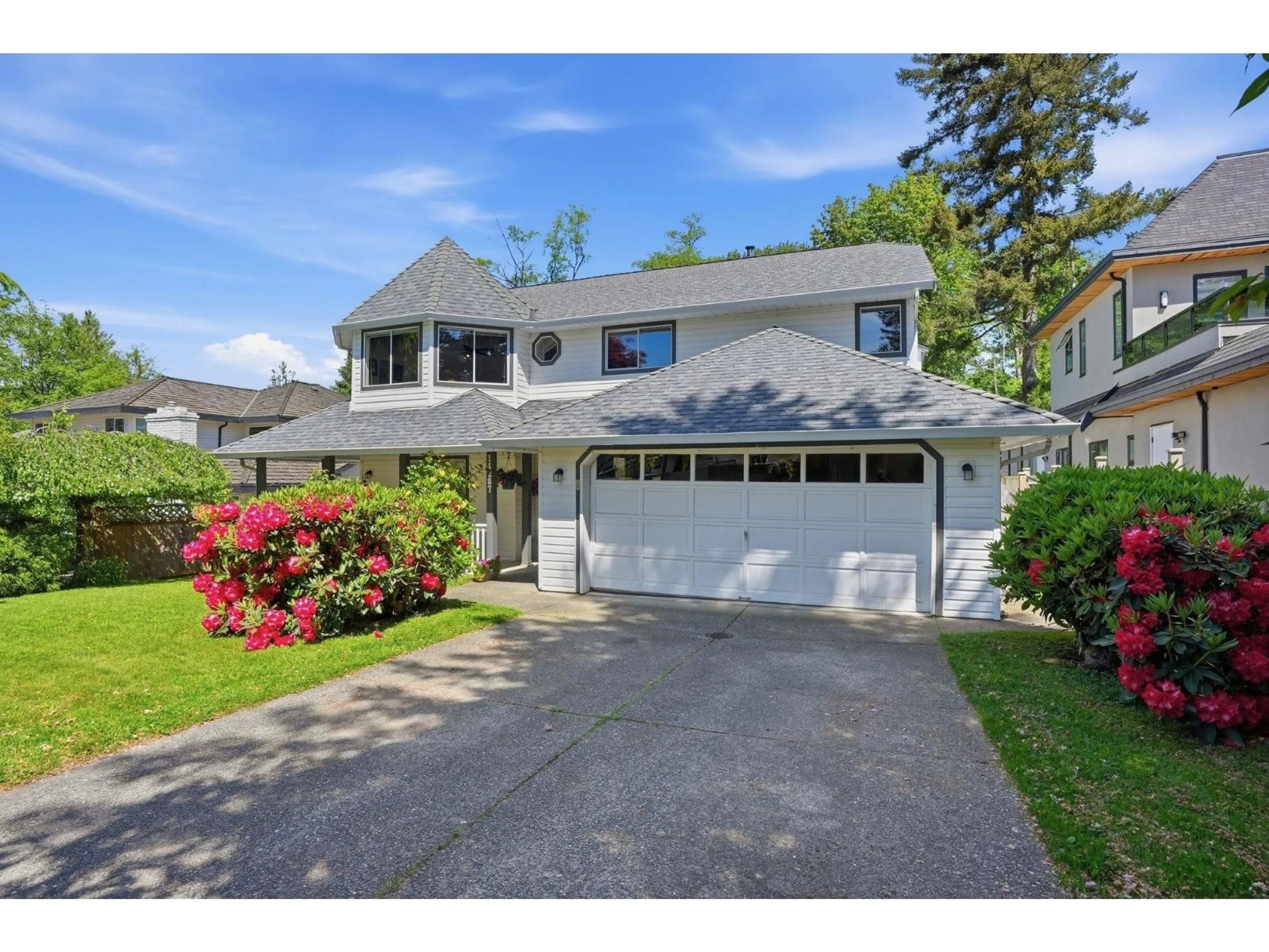 Home with vinyl exterior material, street for 14287 73A AVENUE, Surrey British Columbia V3W2R9