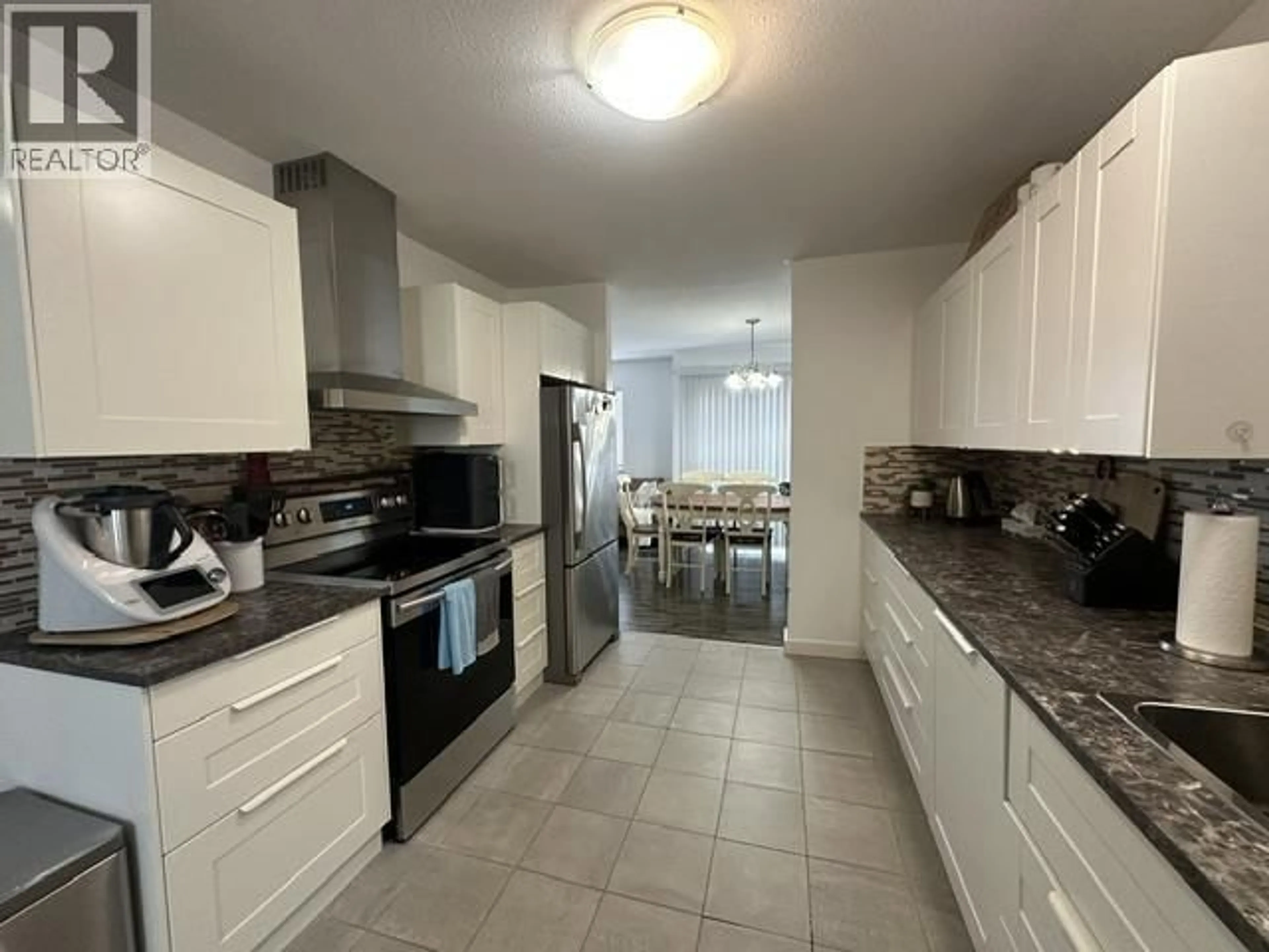 Standard kitchen, ceramic/tile floor for 306 - 9019 86 STREET, Fort St. John British Columbia V1J6X4