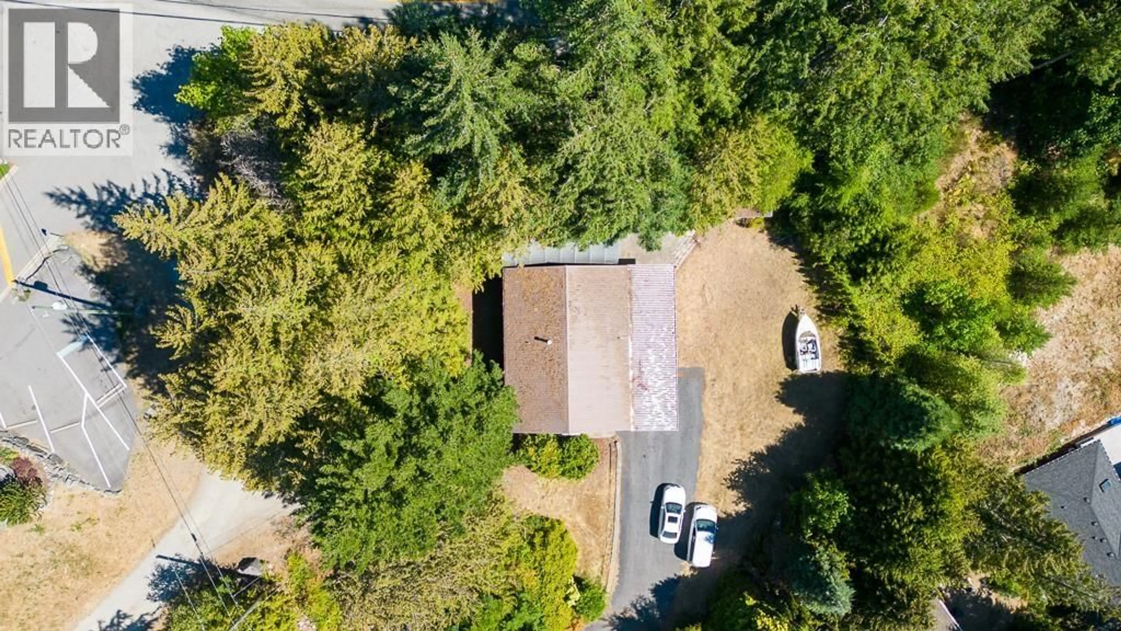 A pic from outside/outdoor area/front of a property/back of a property/a pic from drone, forest/trees view for 5092 JOHNSTONE ROAD, Madeira Park British Columbia V0N2H0