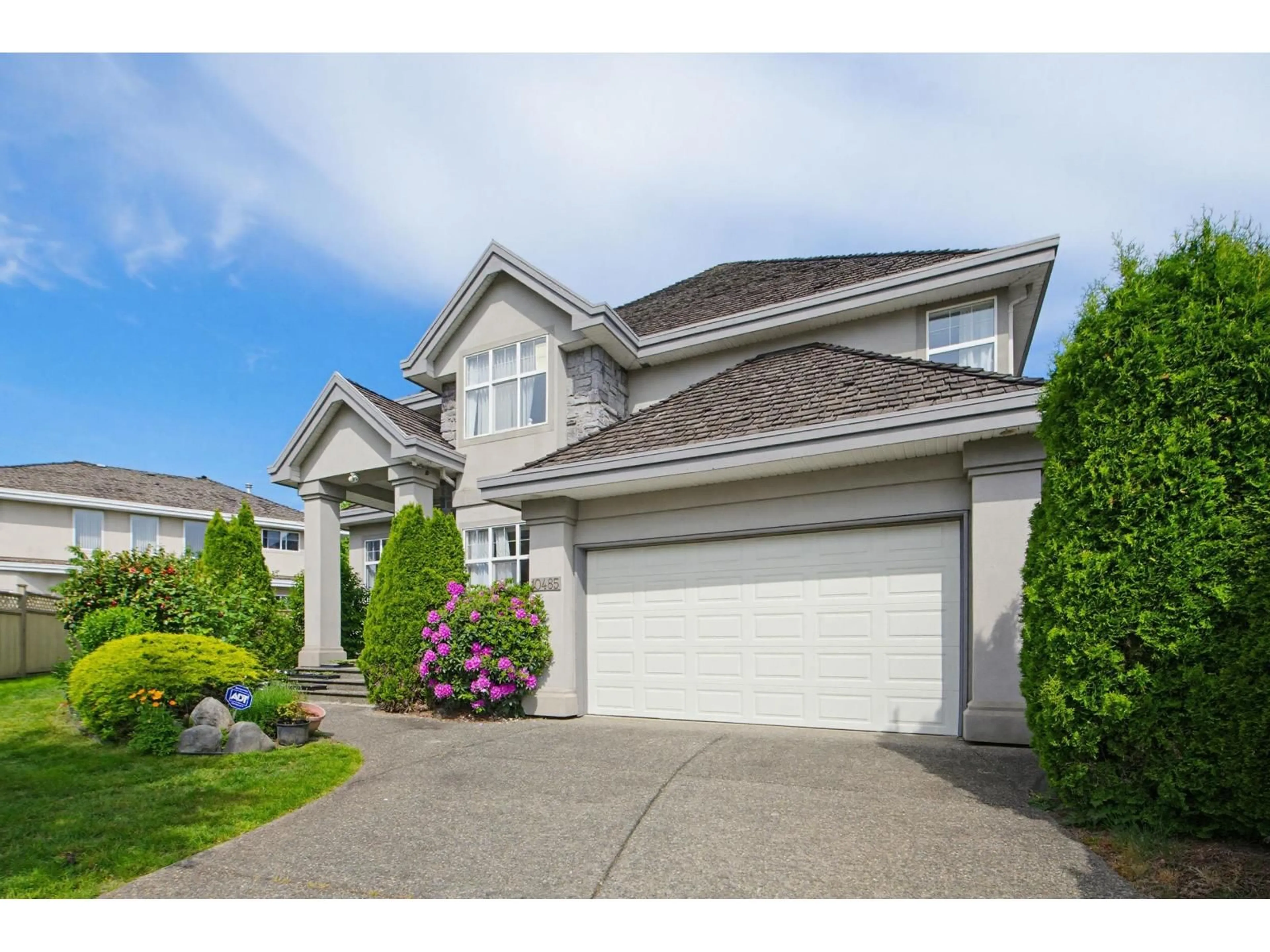 Home with vinyl exterior material, street for 10485 168A STREET, Surrey British Columbia V4N5A8
