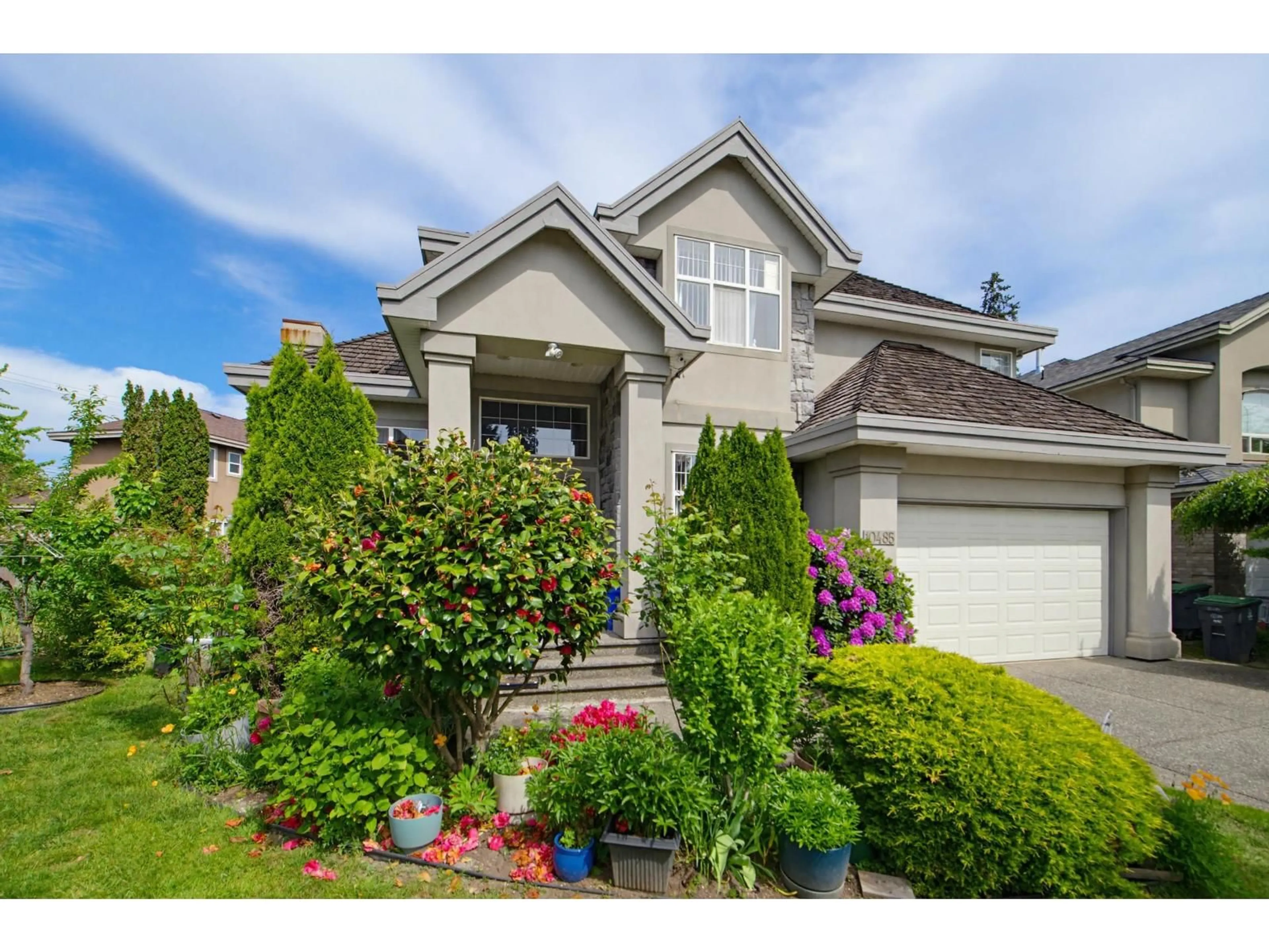 Home with vinyl exterior material, street for 10485 168A STREET, Surrey British Columbia V4N5A8