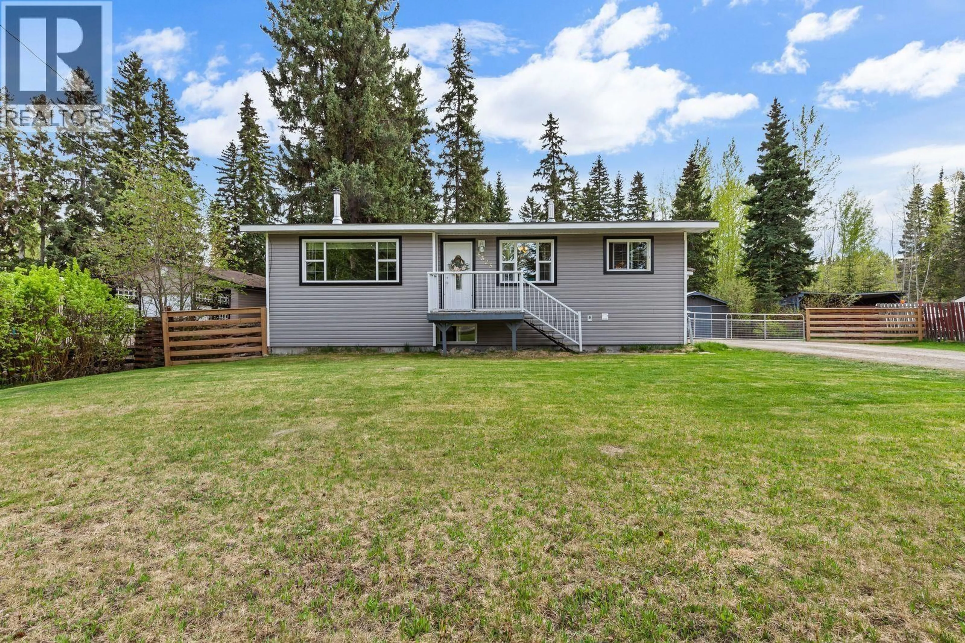 Home with vinyl exterior material, mountain view for 8325 CORRAL ROAD, Prince George British Columbia V2N6N1