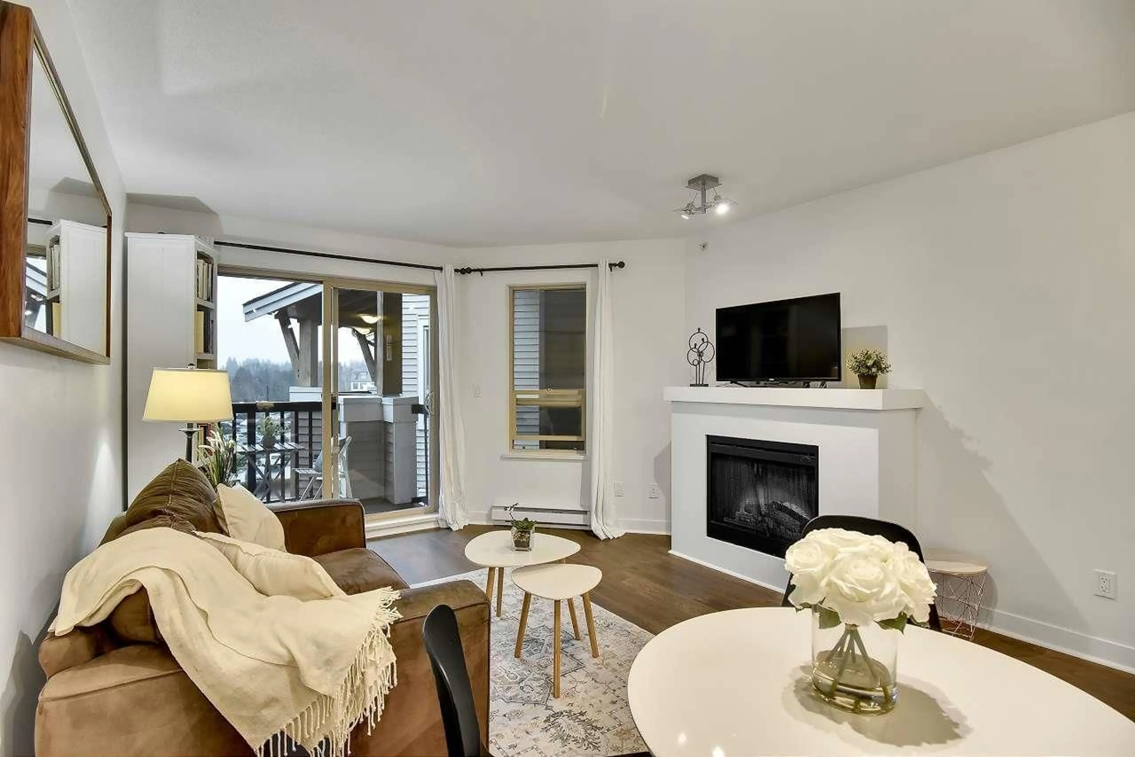 Living room with furniture, wood/laminate floor for 402 - 8915 202 STREET, Langley British Columbia V1M0B5