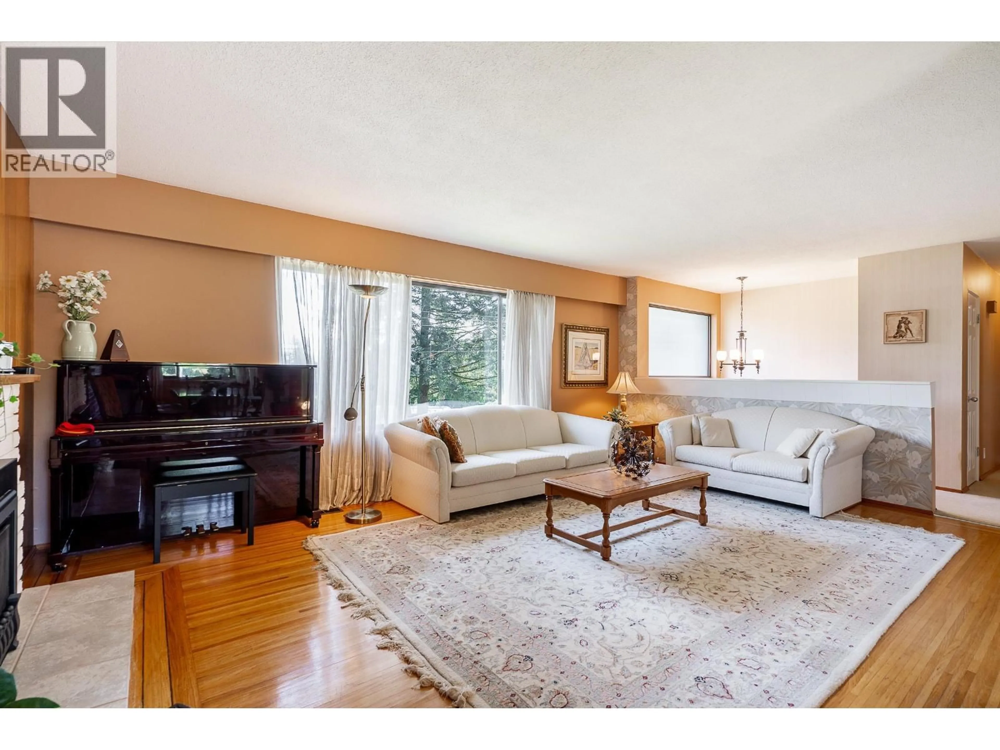 Living room with furniture, wood/laminate floor for 1626 OUGHTON DRIVE, Port Coquitlam British Columbia V3C1H7