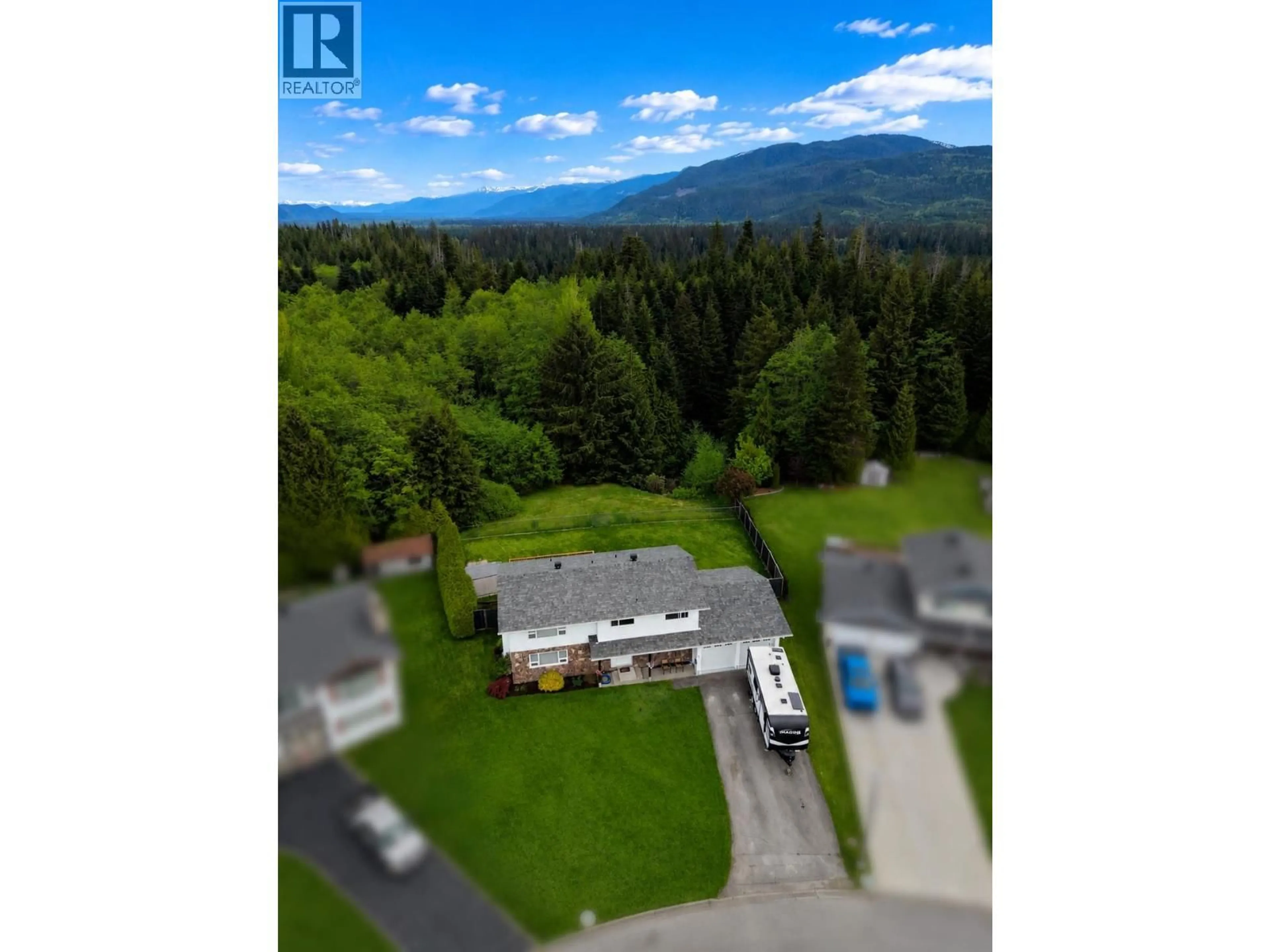 A pic from outside/outdoor area/front of a property/back of a property/a pic from drone, mountain view for 33 MARGETTS STREET, Kitimat British Columbia V8C2L4