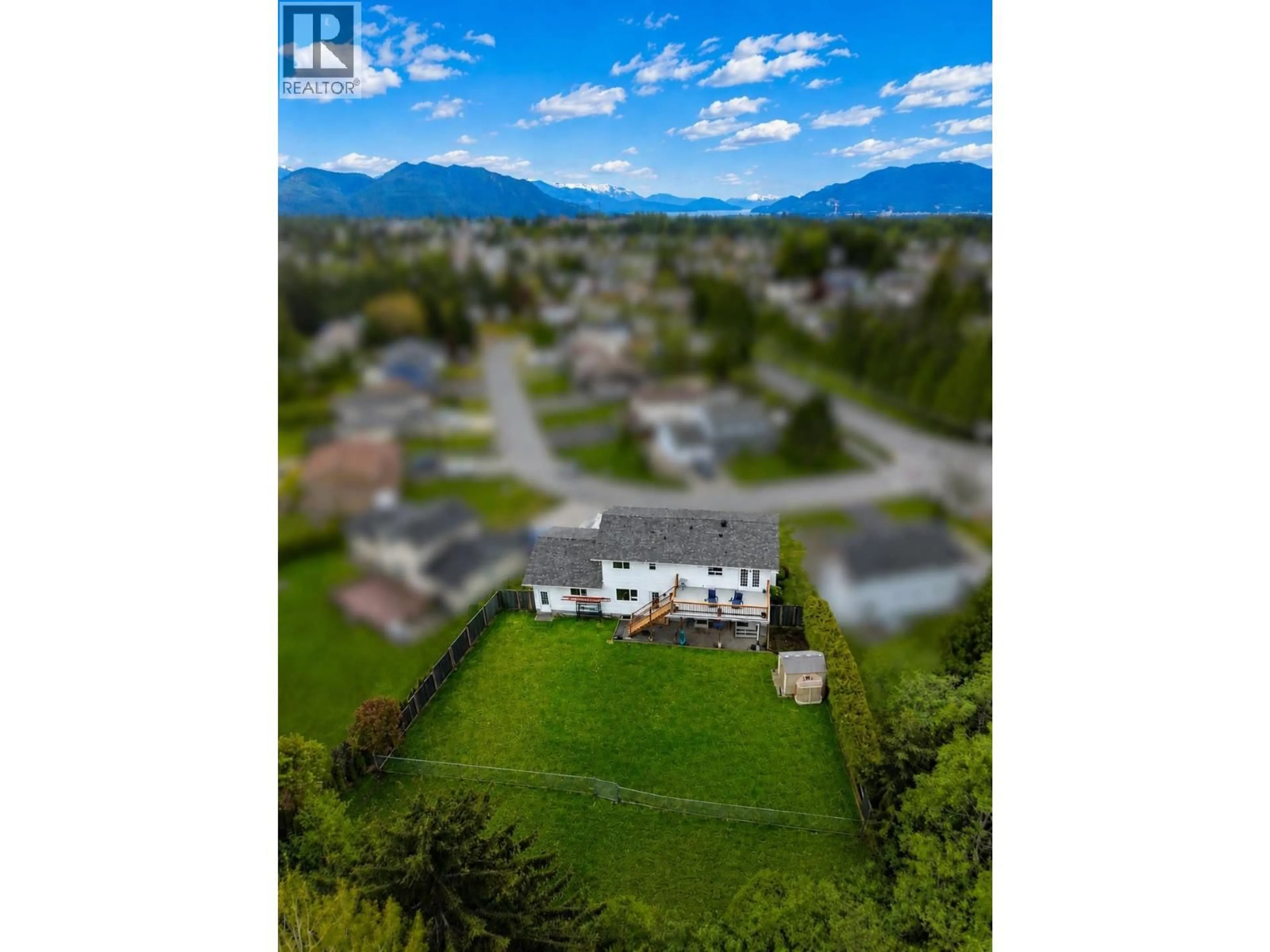 A pic from outside/outdoor area/front of a property/back of a property/a pic from drone, mountain view for 33 MARGETTS STREET, Kitimat British Columbia V8C2L4