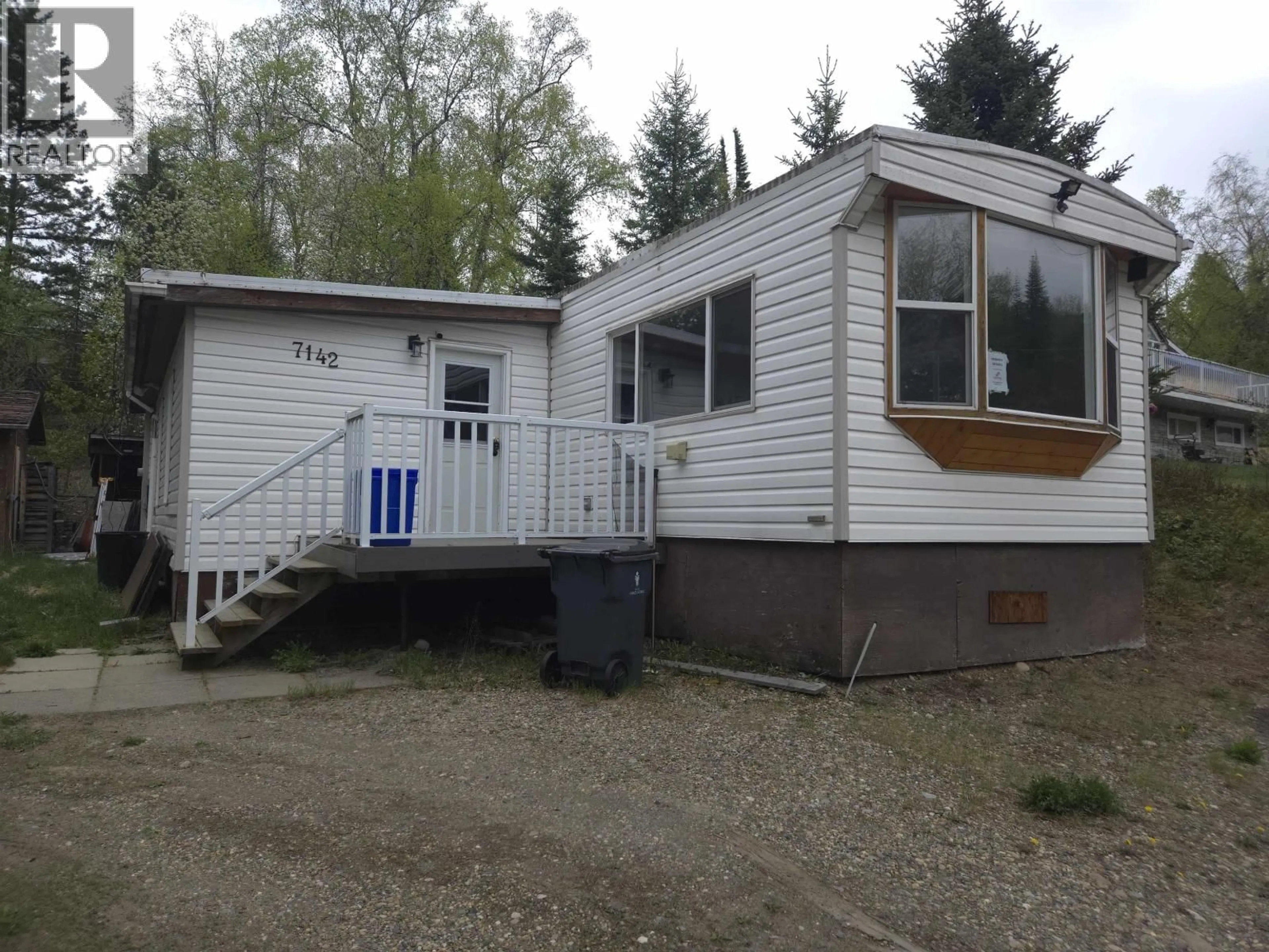 Home with vinyl exterior material, street for 7142 BEAR ROAD, Prince George British Columbia V2N5N7