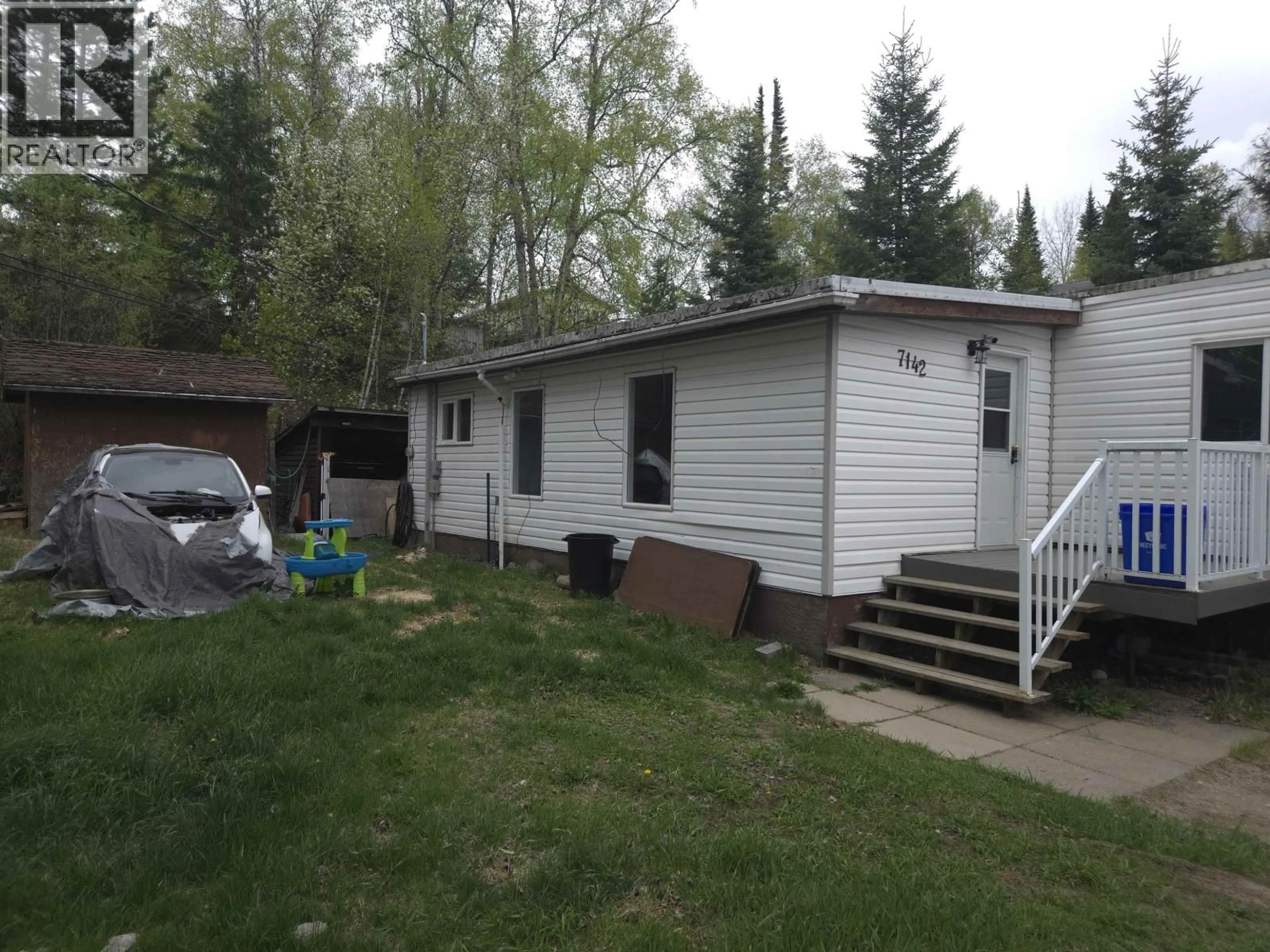 Home with vinyl exterior material, street for 7142 BEAR ROAD, Prince George British Columbia V2N5N7