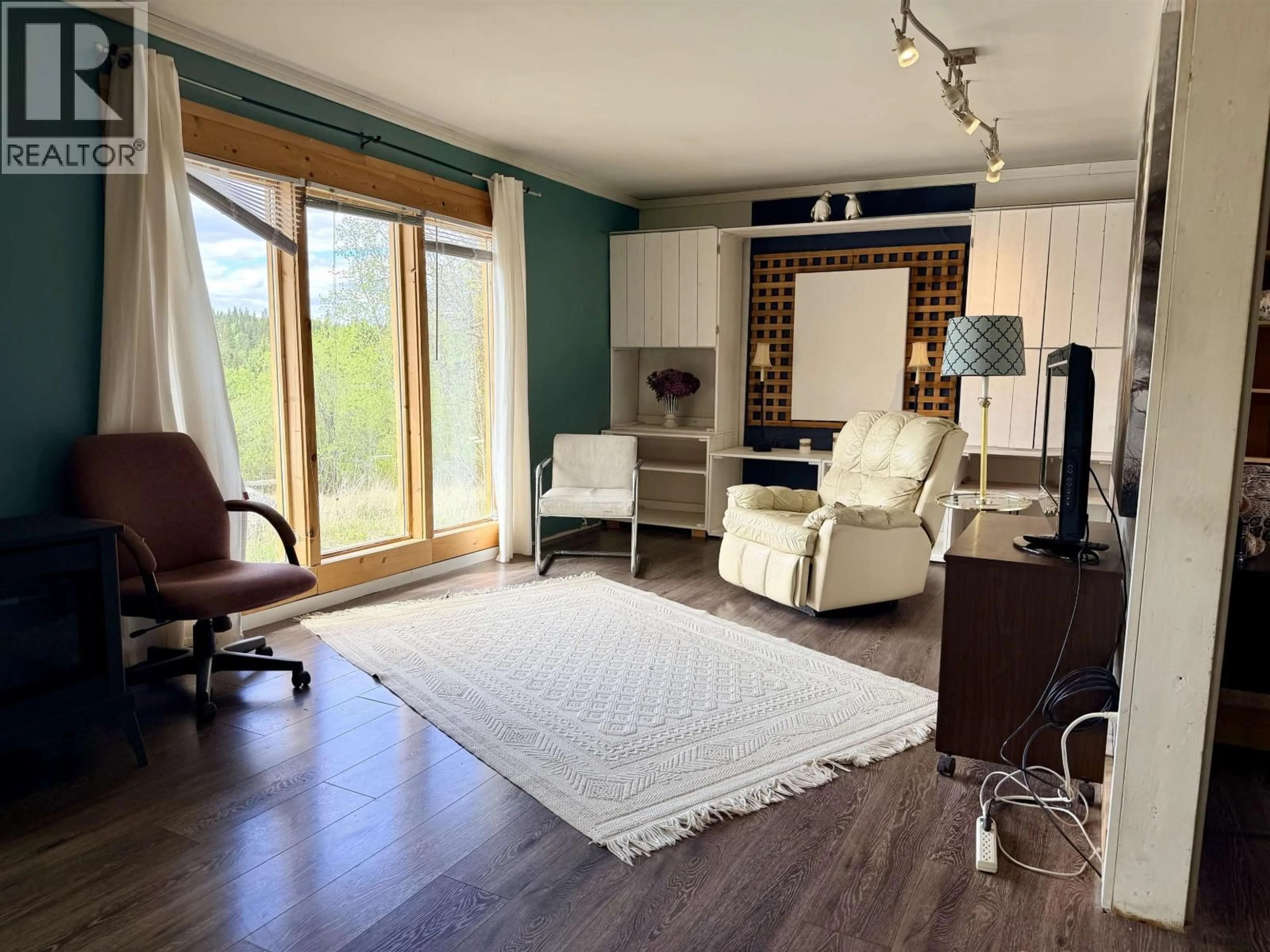 Living room with furniture, wood/laminate floor for 2216 WESTGATE WAY, Fort Fraser British Columbia V0J1N0