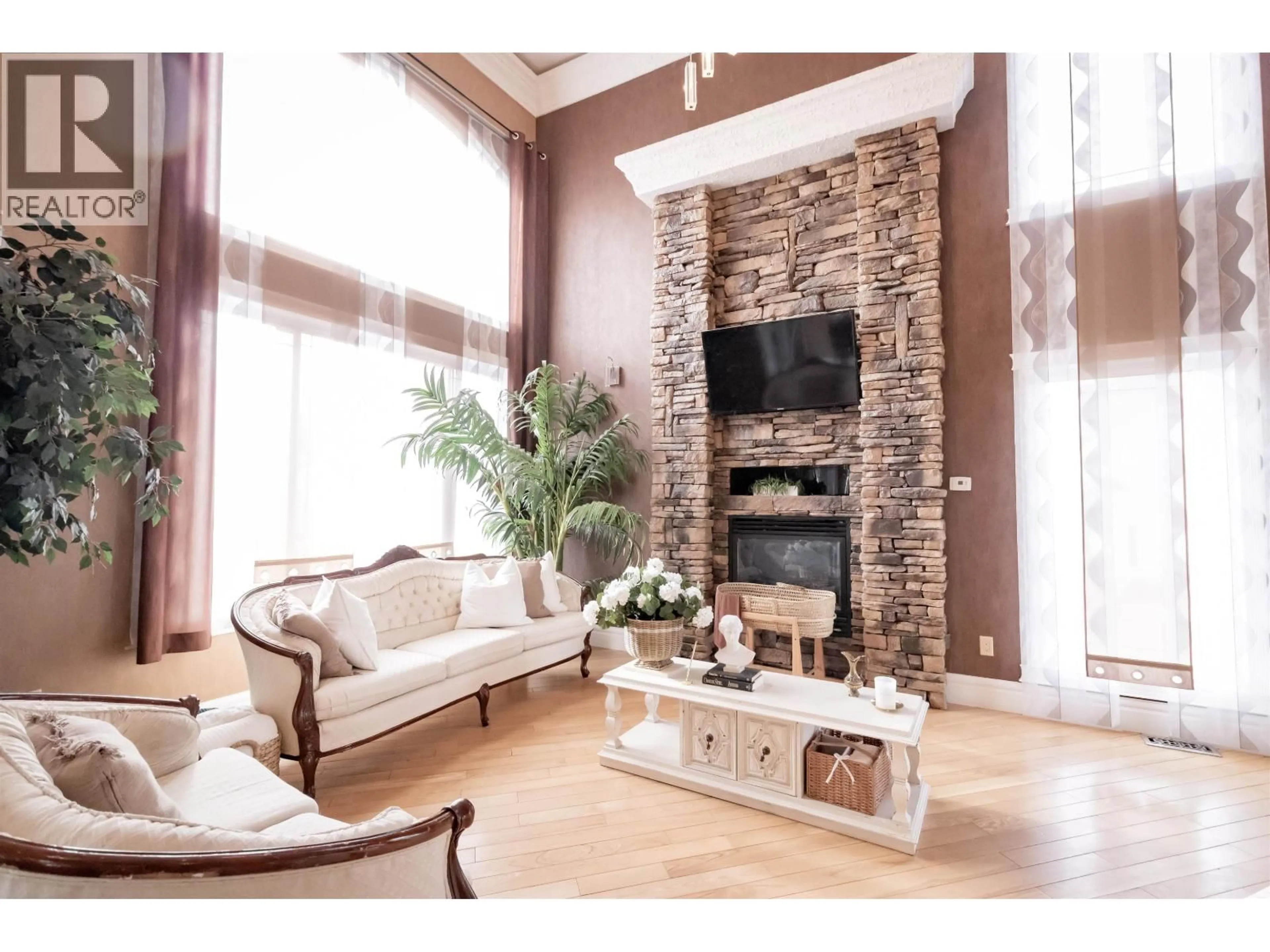 Living room with furniture, wood/laminate floor for 12854 BENS ROAD, Charlie Lake British Columbia V0C1H0