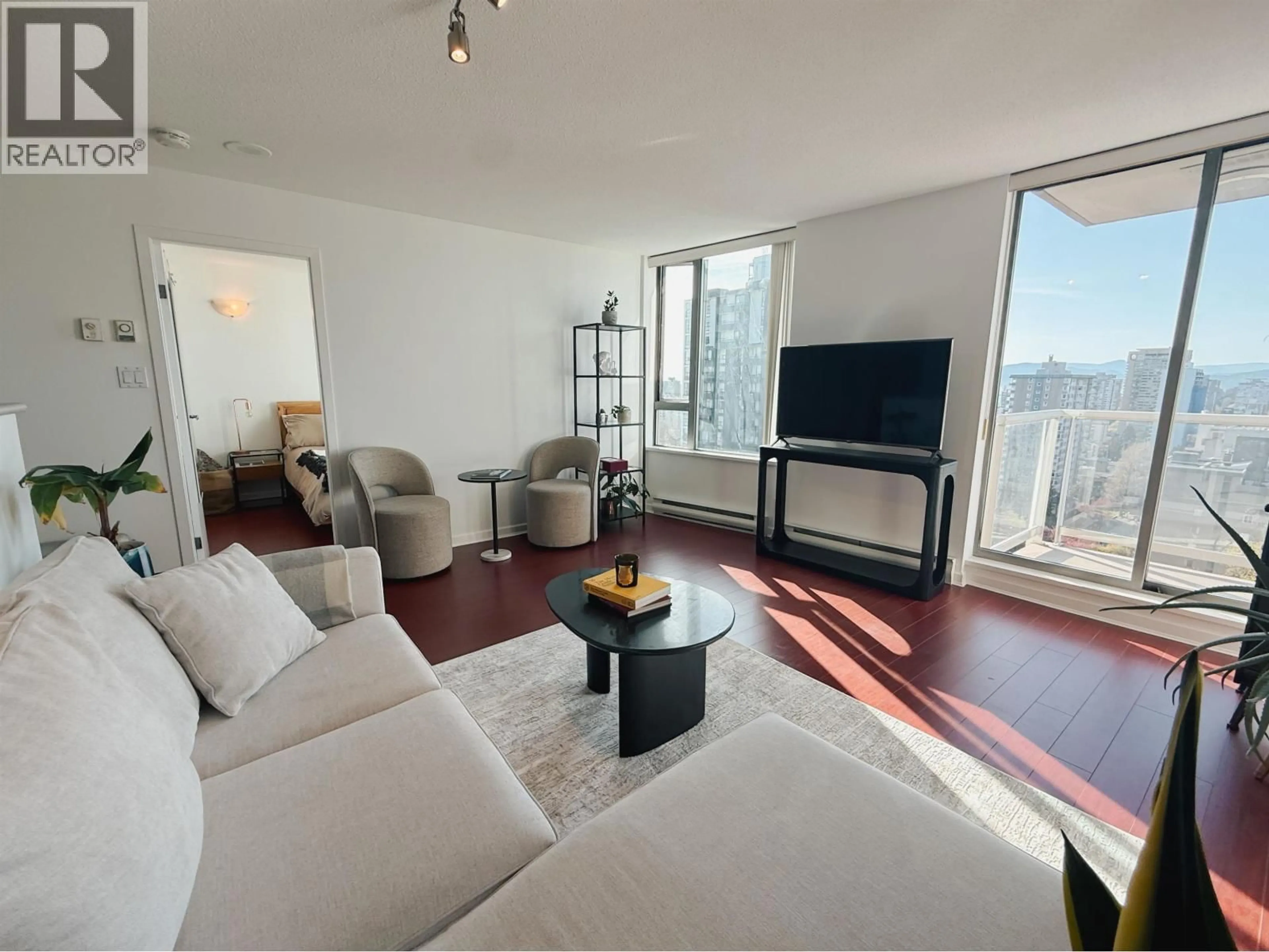 Living room with furniture, wood/laminate floor for 1207 - 1277 NELSON STREET, Vancouver British Columbia V6E4M8