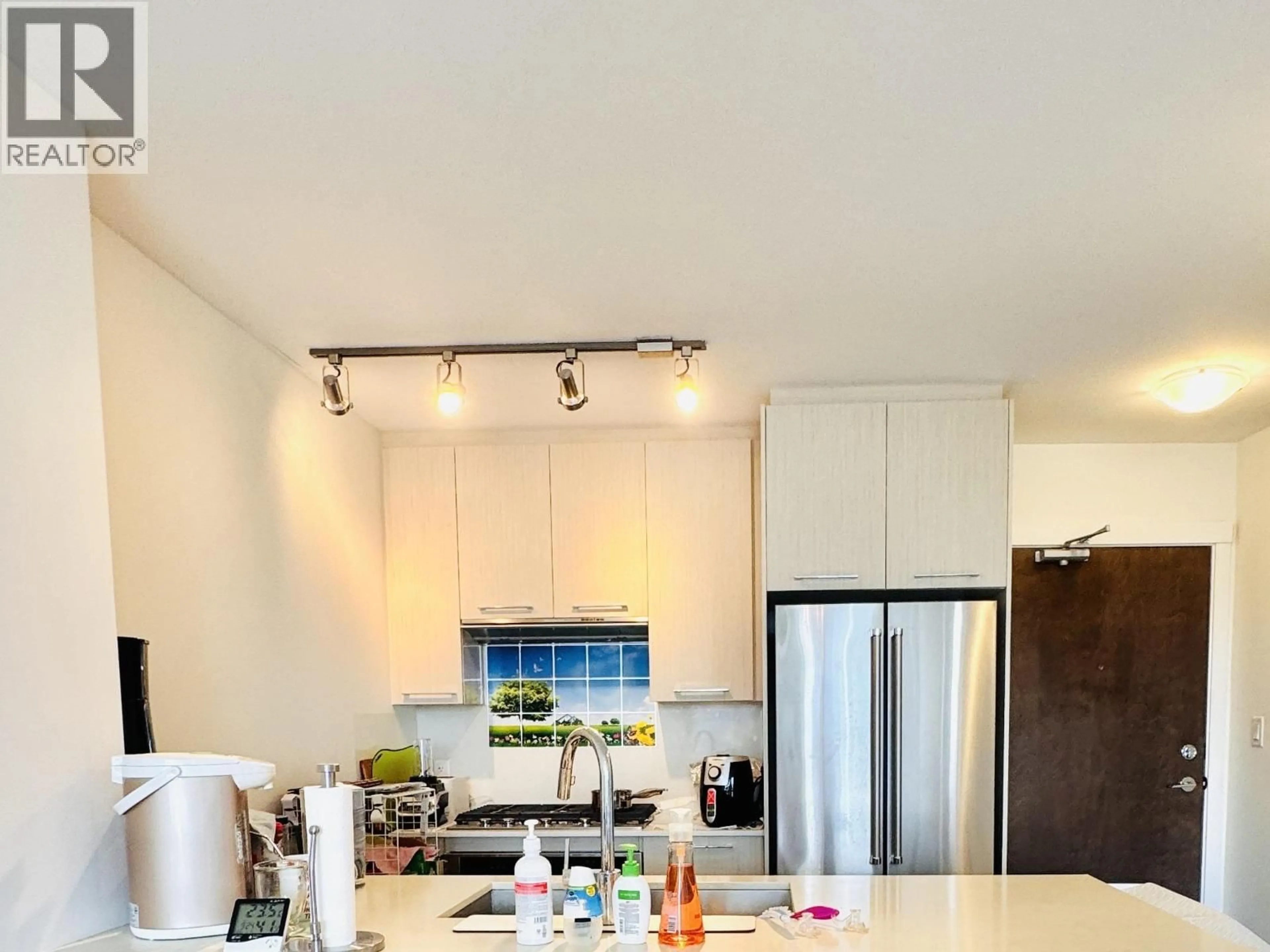 Open concept kitchen, unknown for 603 - 5619 CEDARBRIDGE WAY, Richmond British Columbia V6X0P8