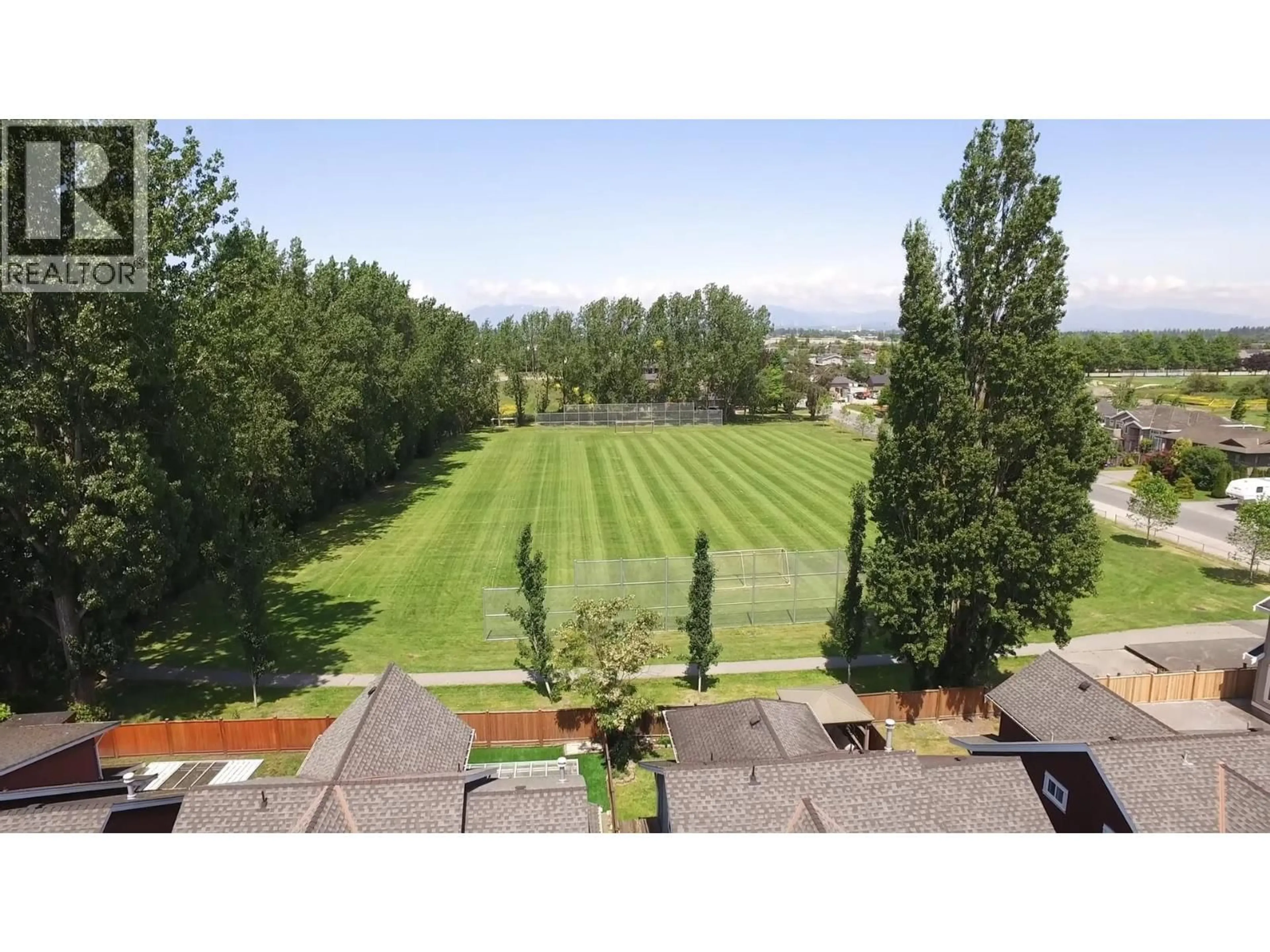 A pic from outside/outdoor area/front of a property/back of a property/a pic from drone, mountain view for 6039 46A AVENUE, Delta British Columbia V4K5G2