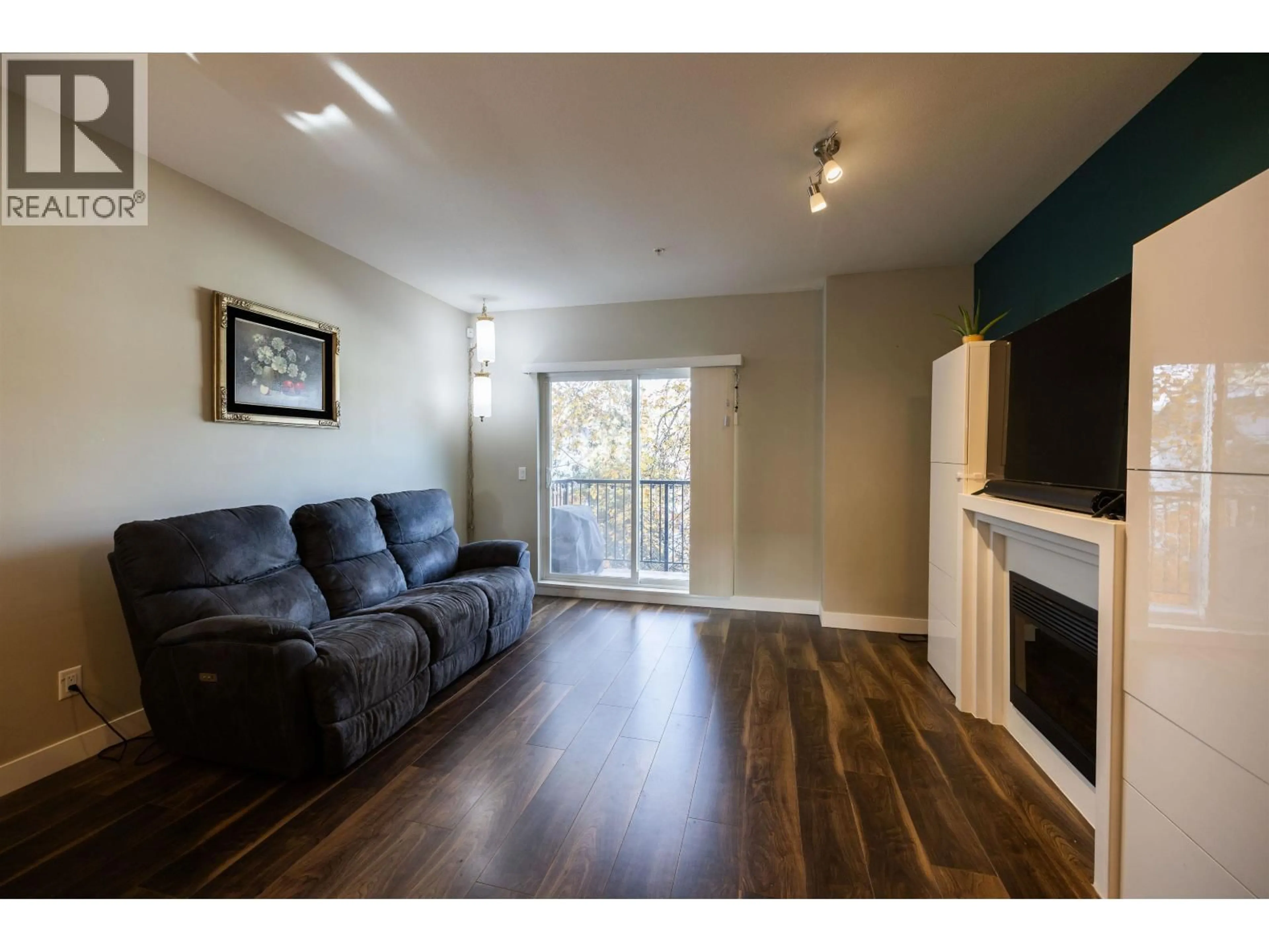 Living room with furniture, wood/laminate floor for 229 - 3888 NORFOLK STREET, Burnaby British Columbia V5G1E5