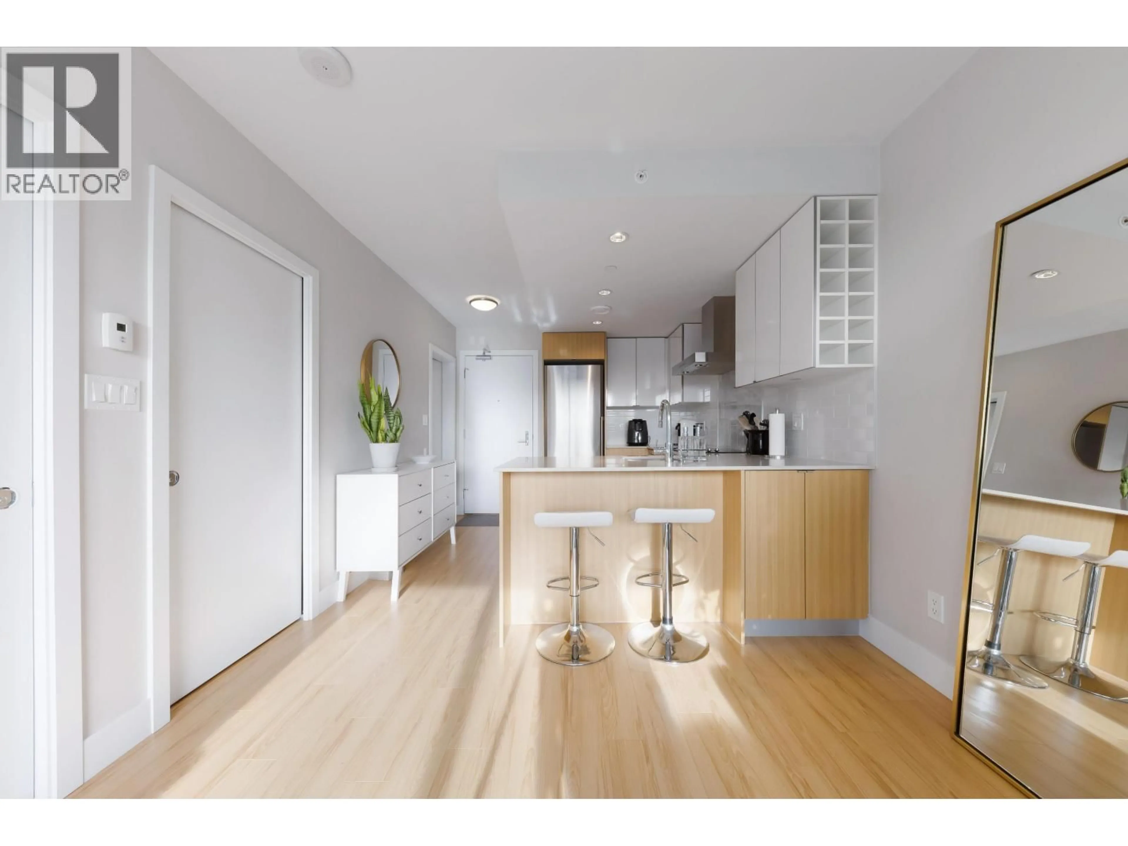 Open concept kitchen, wood/laminate floor for 616 - 159 2ND AVENUE, Vancouver British Columbia V5Y0L8