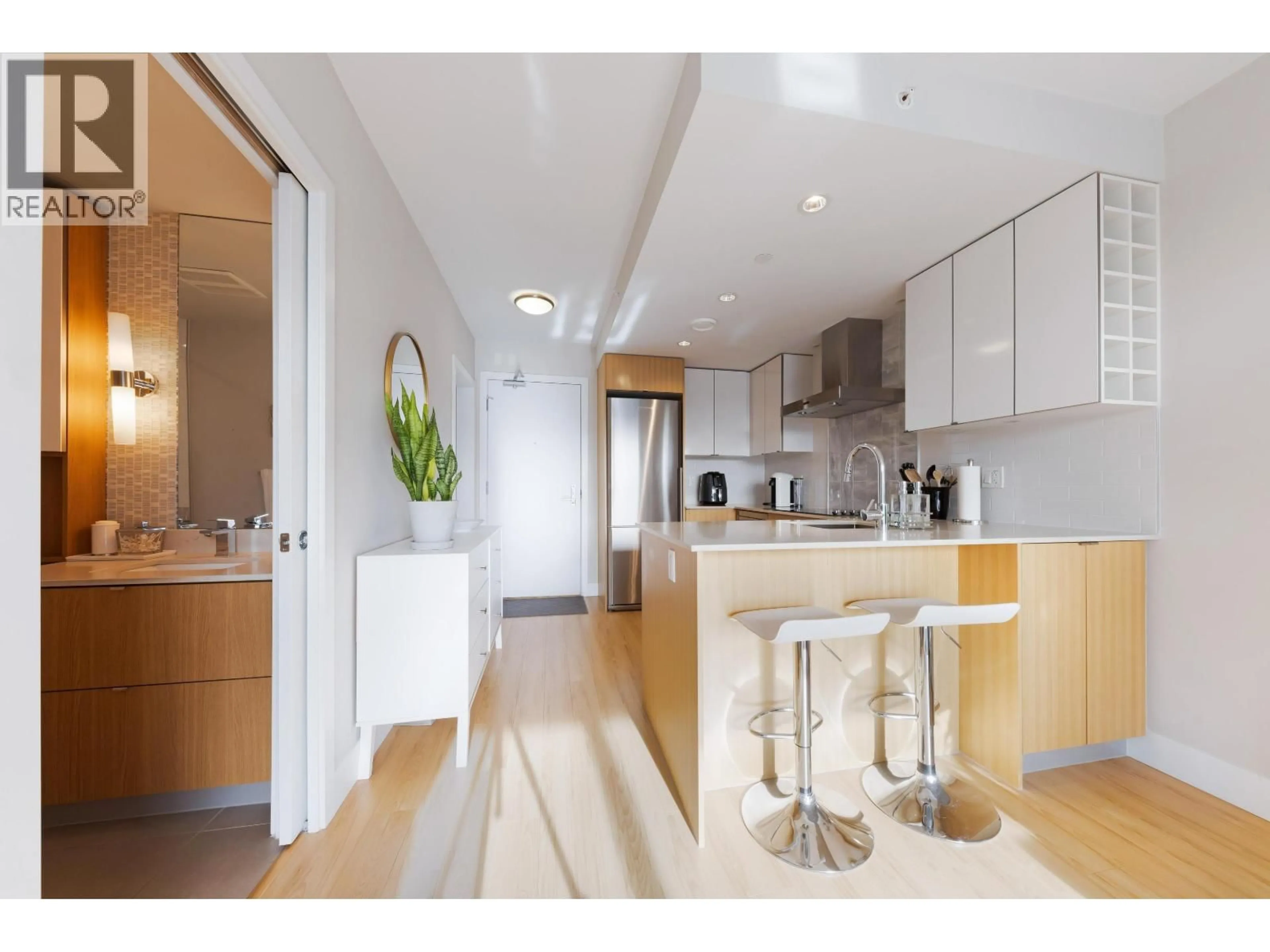 Open concept kitchen, wood/laminate floor for 616 - 159 2ND AVENUE, Vancouver British Columbia V5Y0L8