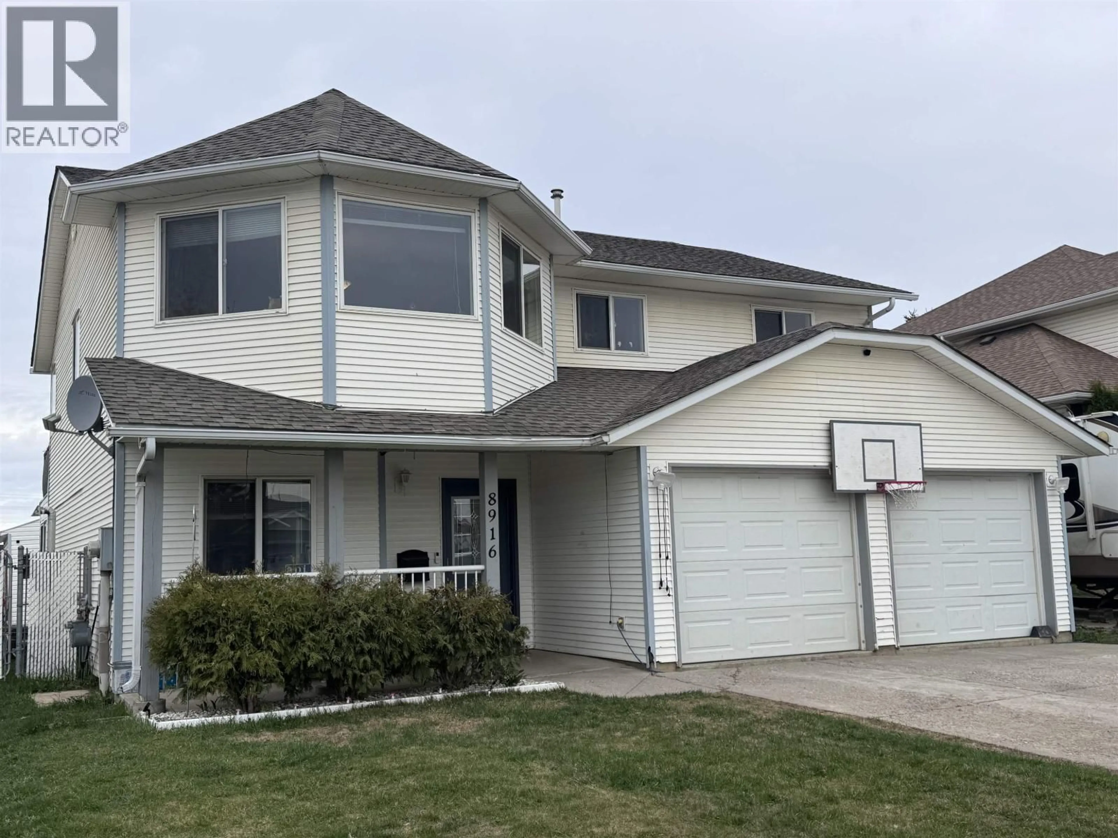 Home with vinyl exterior material, street for 8916 84A STREET, Fort St. John British Columbia V1J6T1