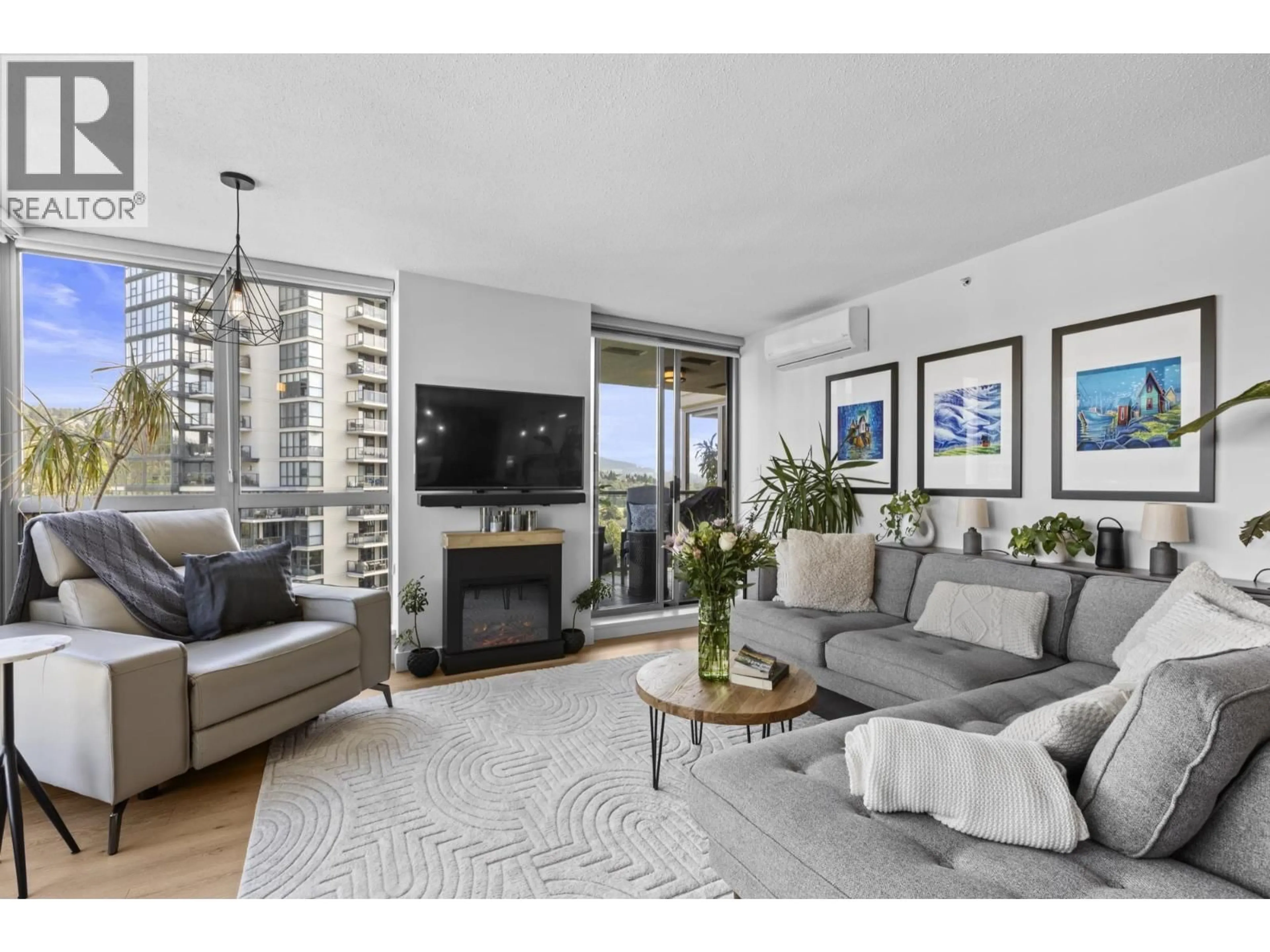 Living room with furniture, unknown for 1706 - 295 GUILDFORD WAY, Port Moody British Columbia V3H5N3