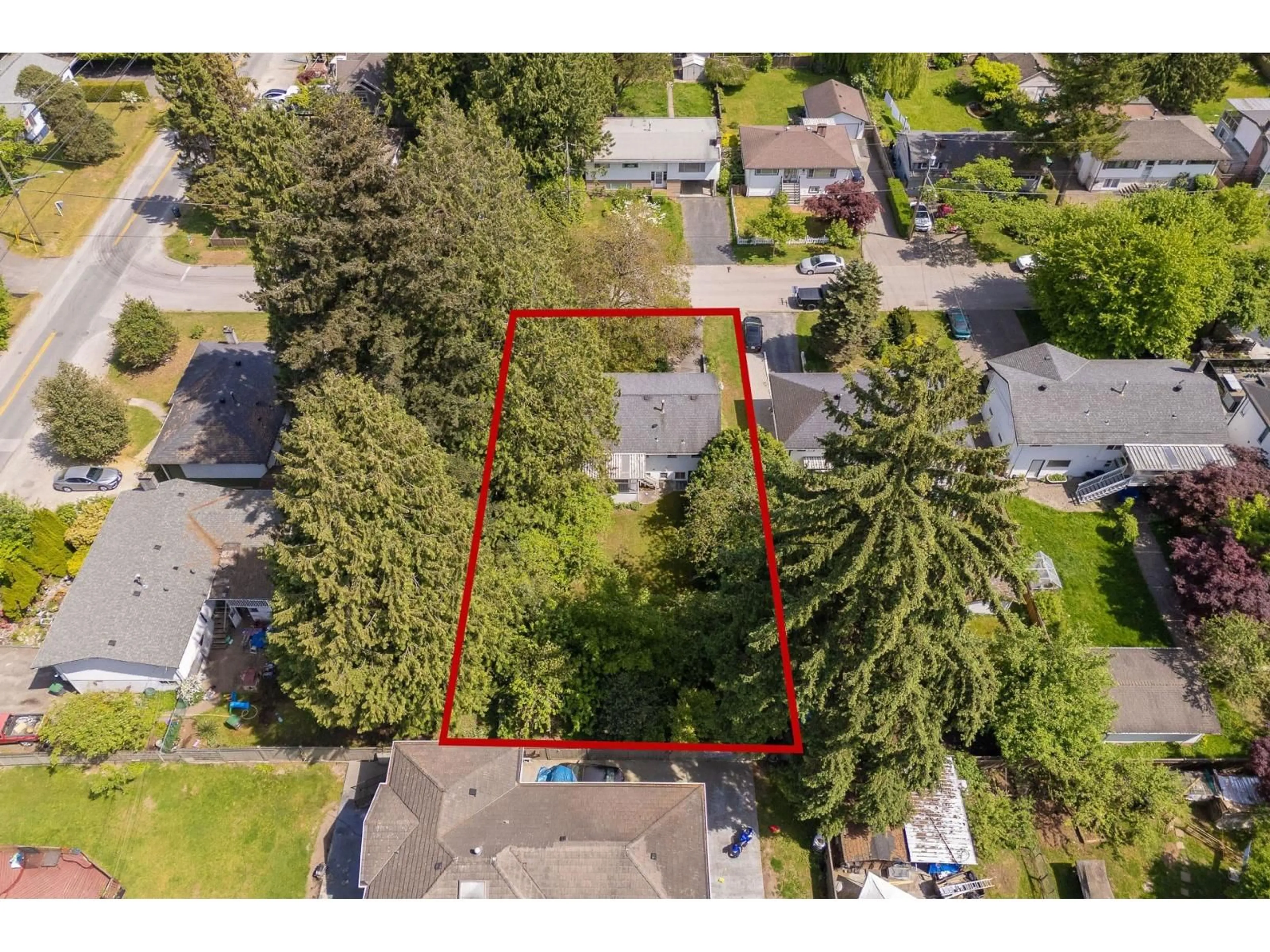 A pic from outside/outdoor area/front of a property/back of a property/a pic from drone, street for 10973 144A STREET, Surrey British Columbia V3R3P9
