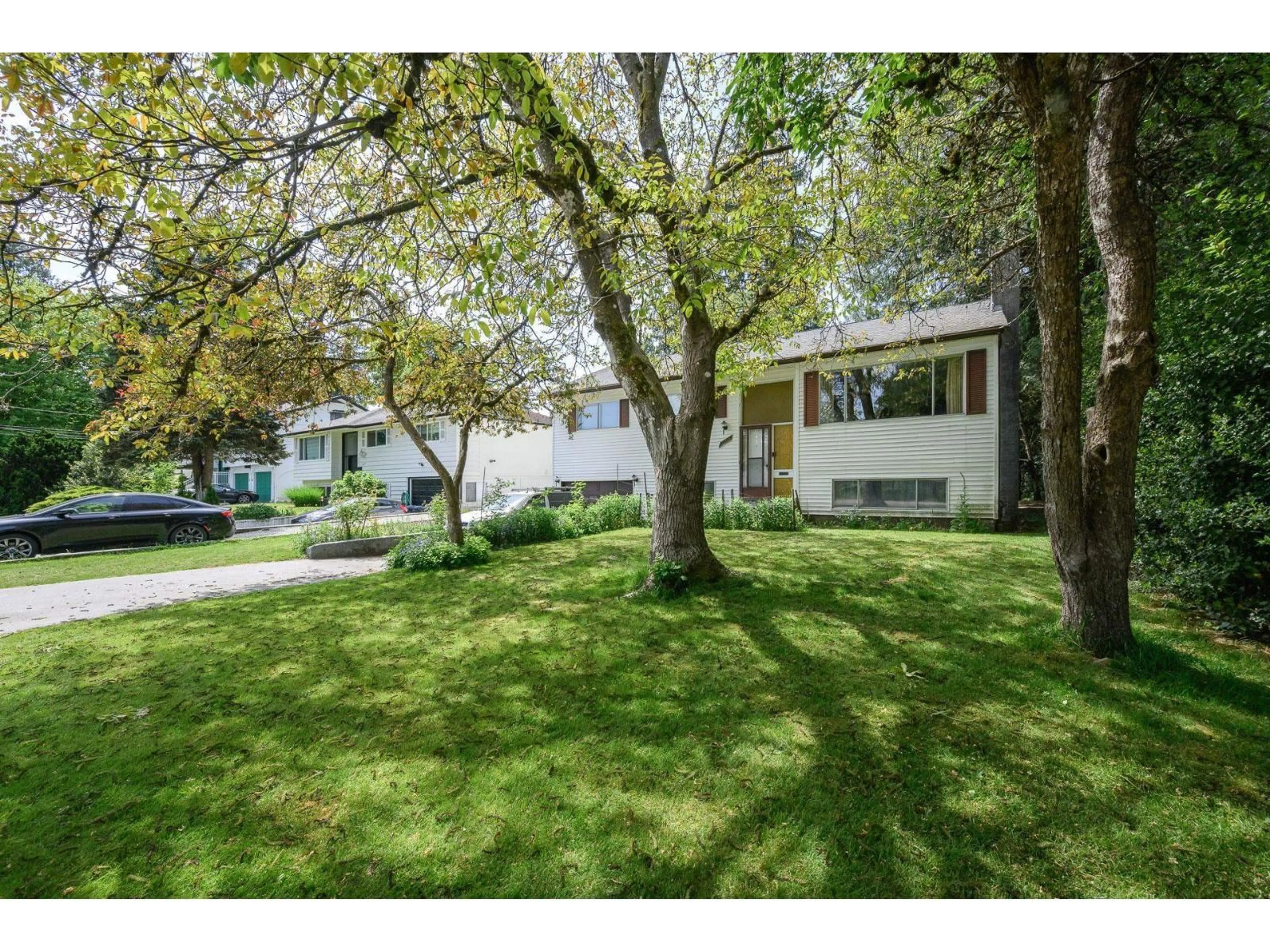 A pic from outside/outdoor area/front of a property/back of a property/a pic from drone, street for 10973 144A STREET, Surrey British Columbia V3R3P9