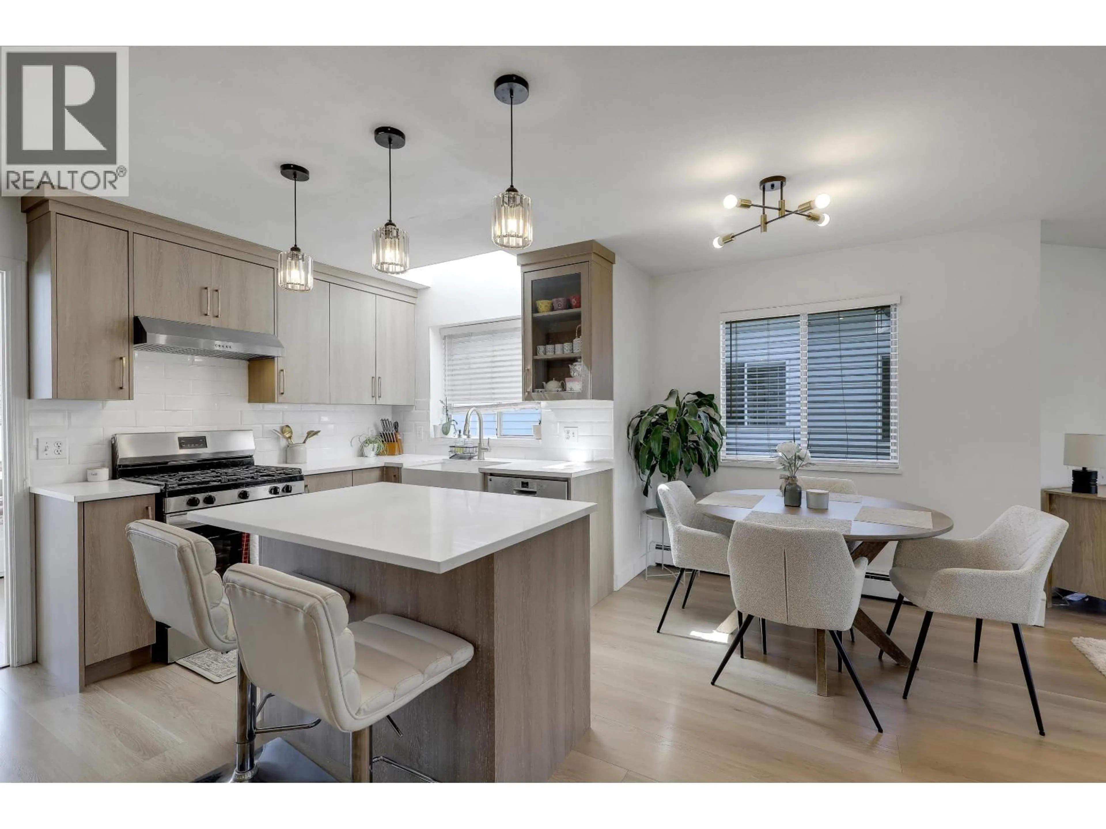 Open concept kitchen, ceramic/tile floor for 1931 JACANA AVENUE, Port Coquitlam British Columbia V3C5Y4