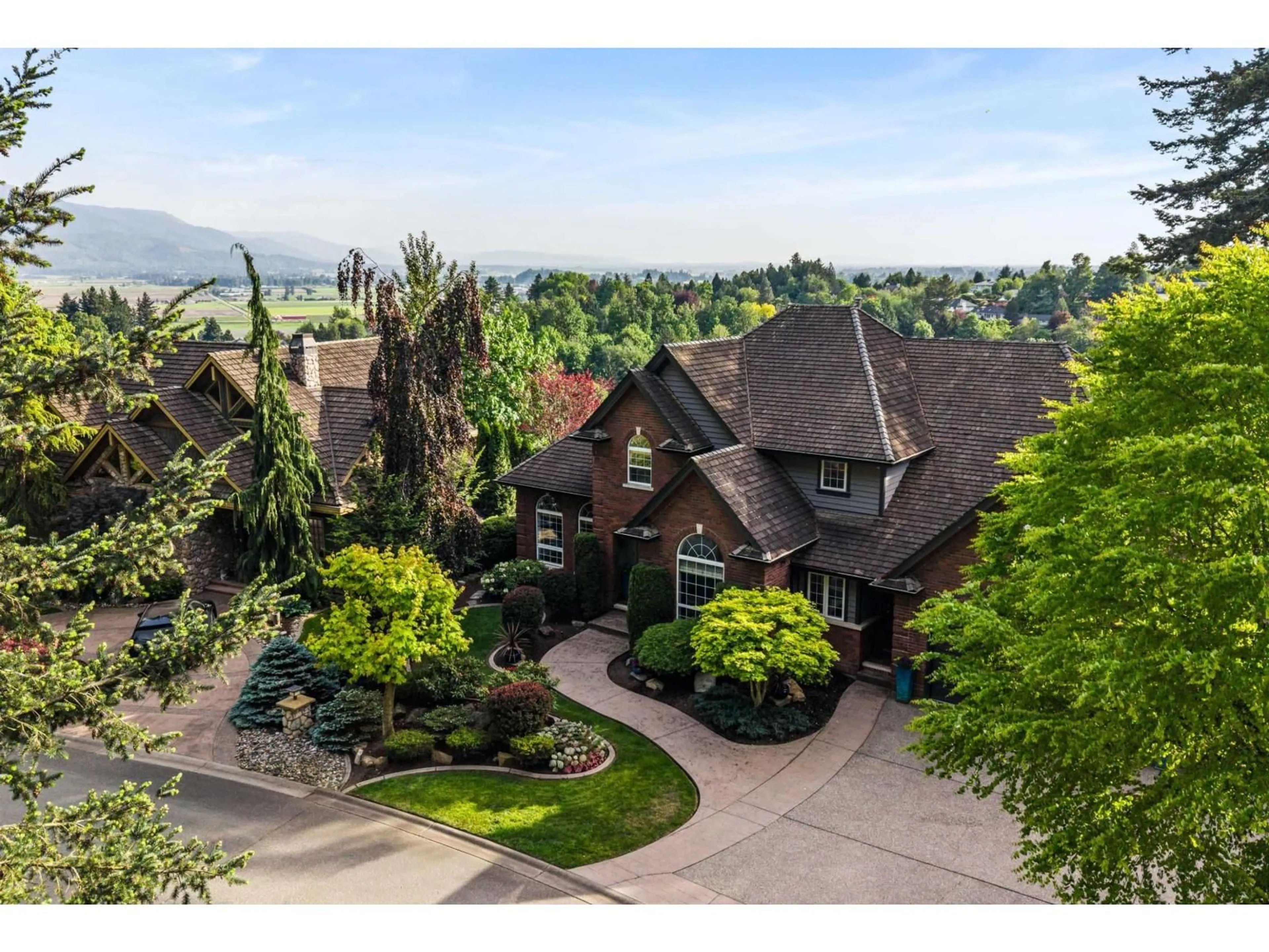 A pic from outside/outdoor area/front of a property/back of a property/a pic from drone, mountain view for 2405 CRANBERRY COURT, Abbotsford British Columbia V3G2W8