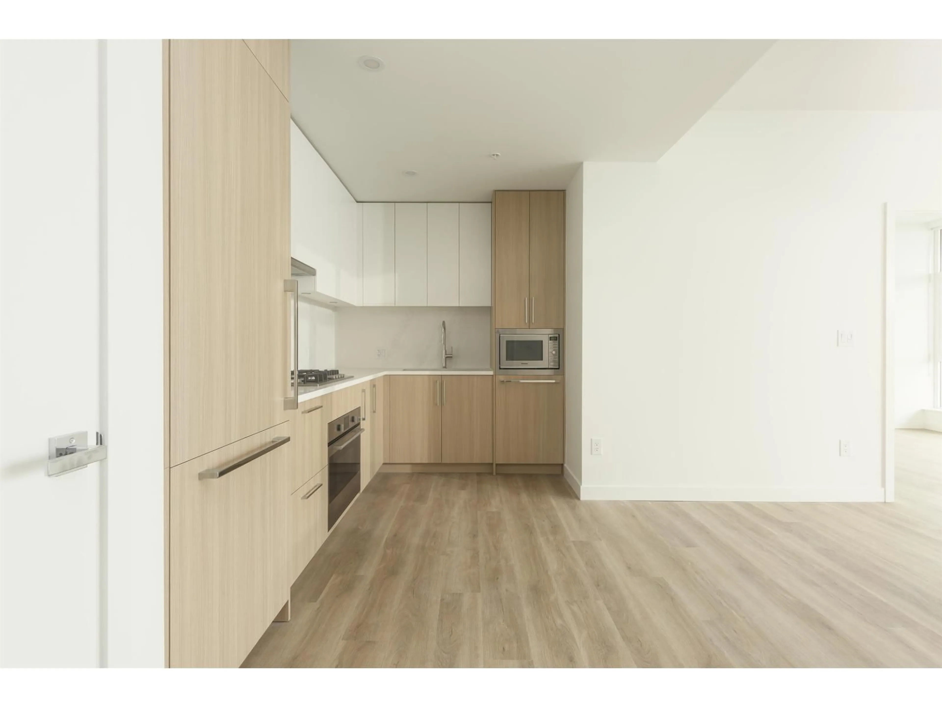 Standard kitchen, wood/laminate floor for 305 - 9675 KING GEORGE BOULEVARD, Surrey British Columbia V3T0T7