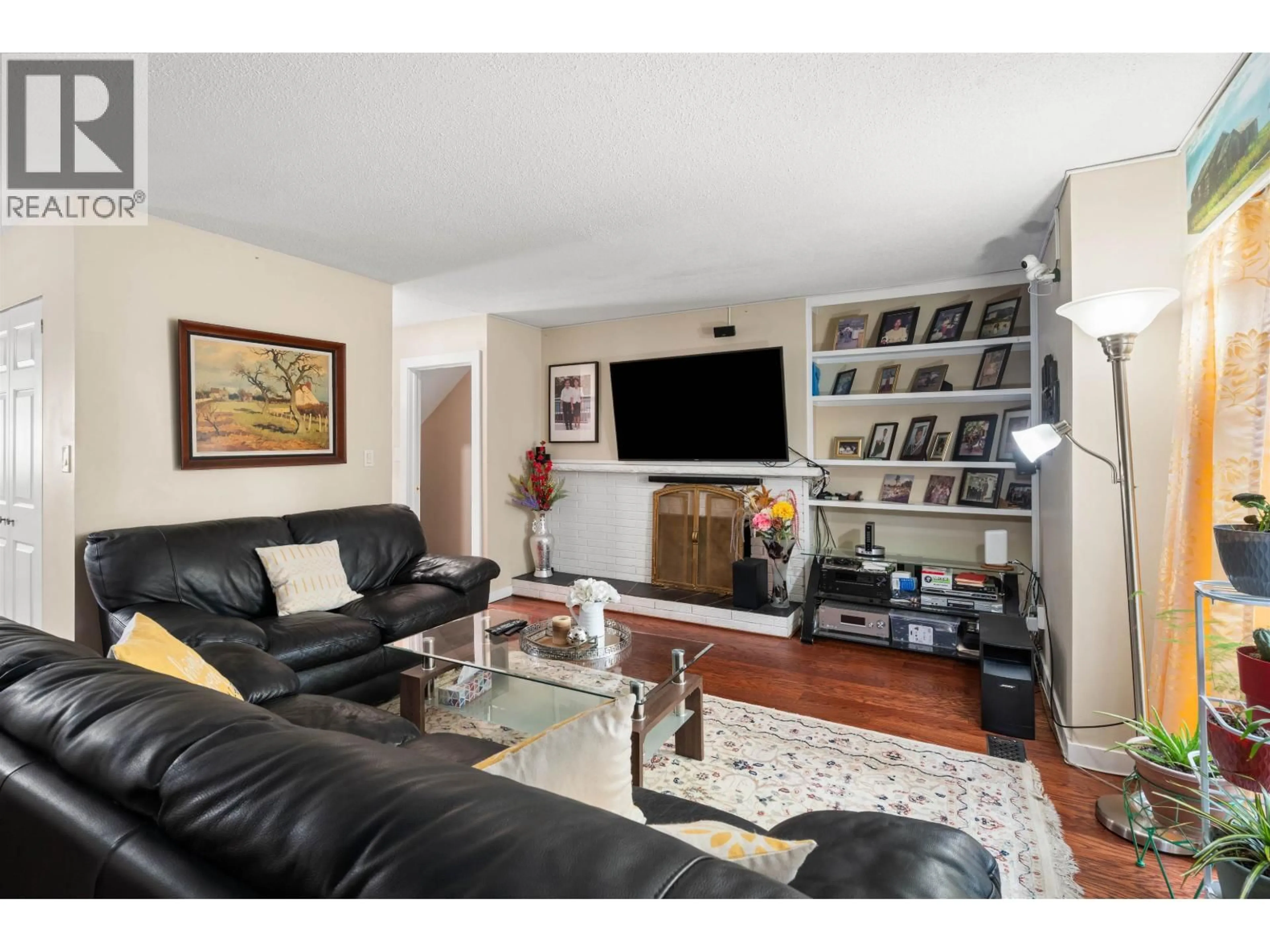 Living room with furniture, wood/laminate floor for 883 OLD LILLOOET ROAD, North Vancouver British Columbia V7J2H6