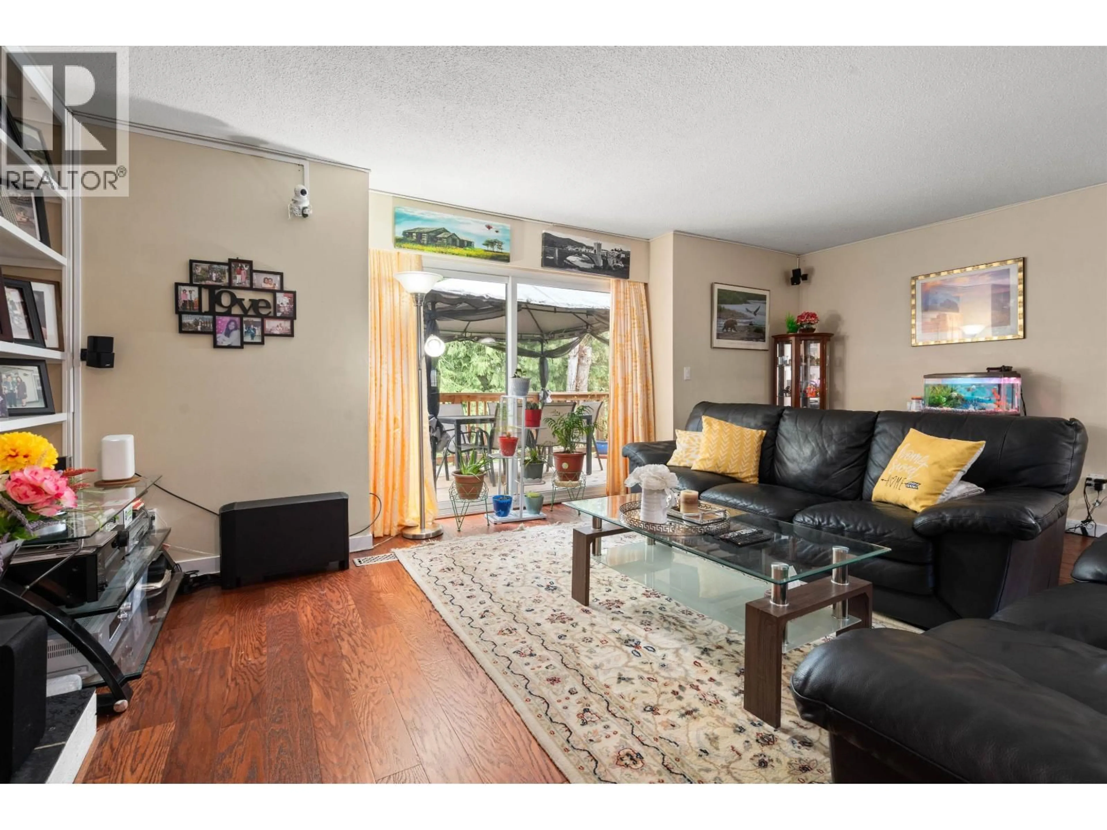 Living room with furniture, wood/laminate floor for 883 OLD LILLOOET ROAD, North Vancouver British Columbia V7J2H6