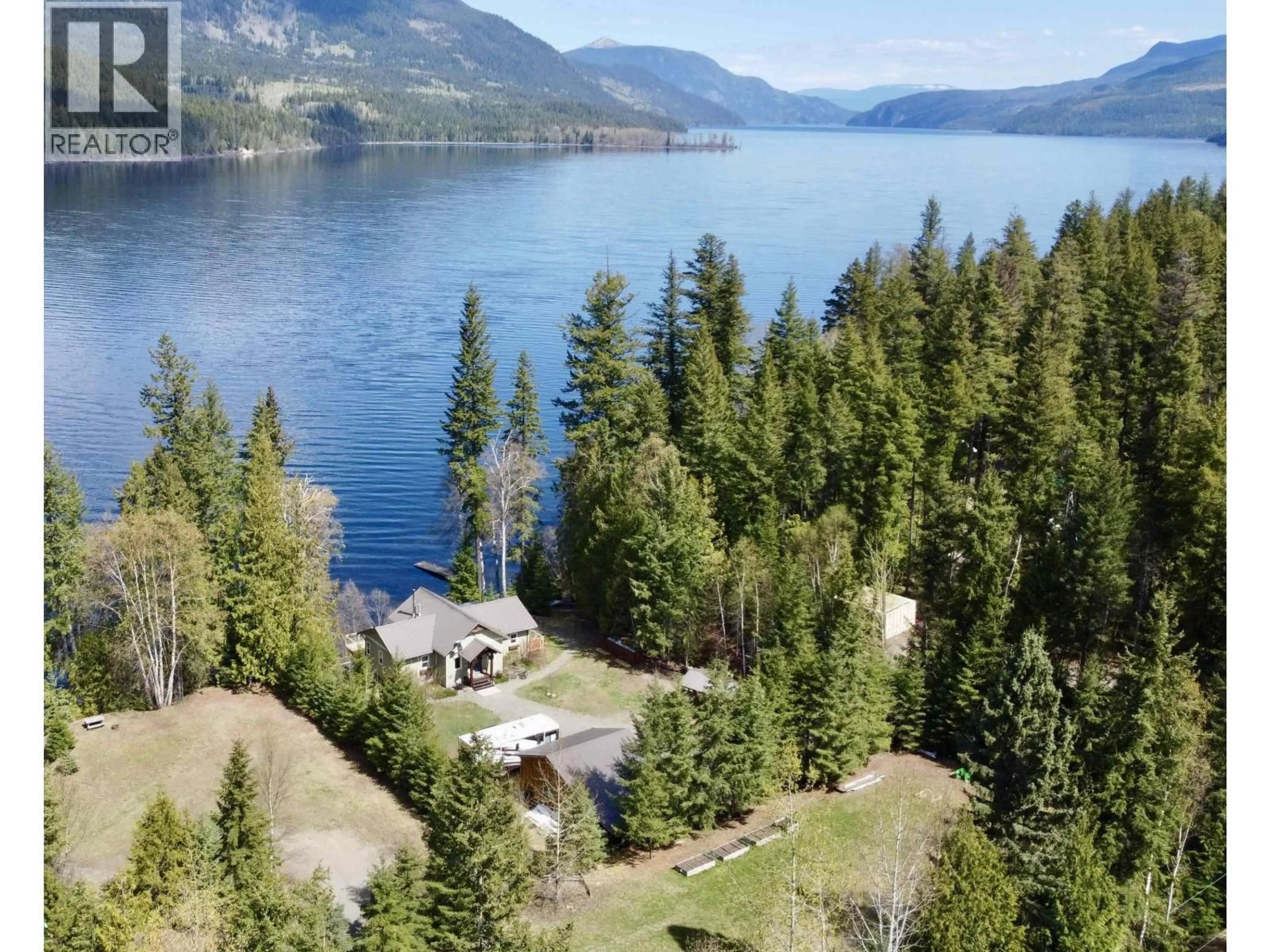 A pic from outside/outdoor area/front of a property/back of a property/a pic from drone, water/lake/river/ocean view for 8989 MAHOOD LAKE ROAD, Canim Lake British Columbia V0K1J0