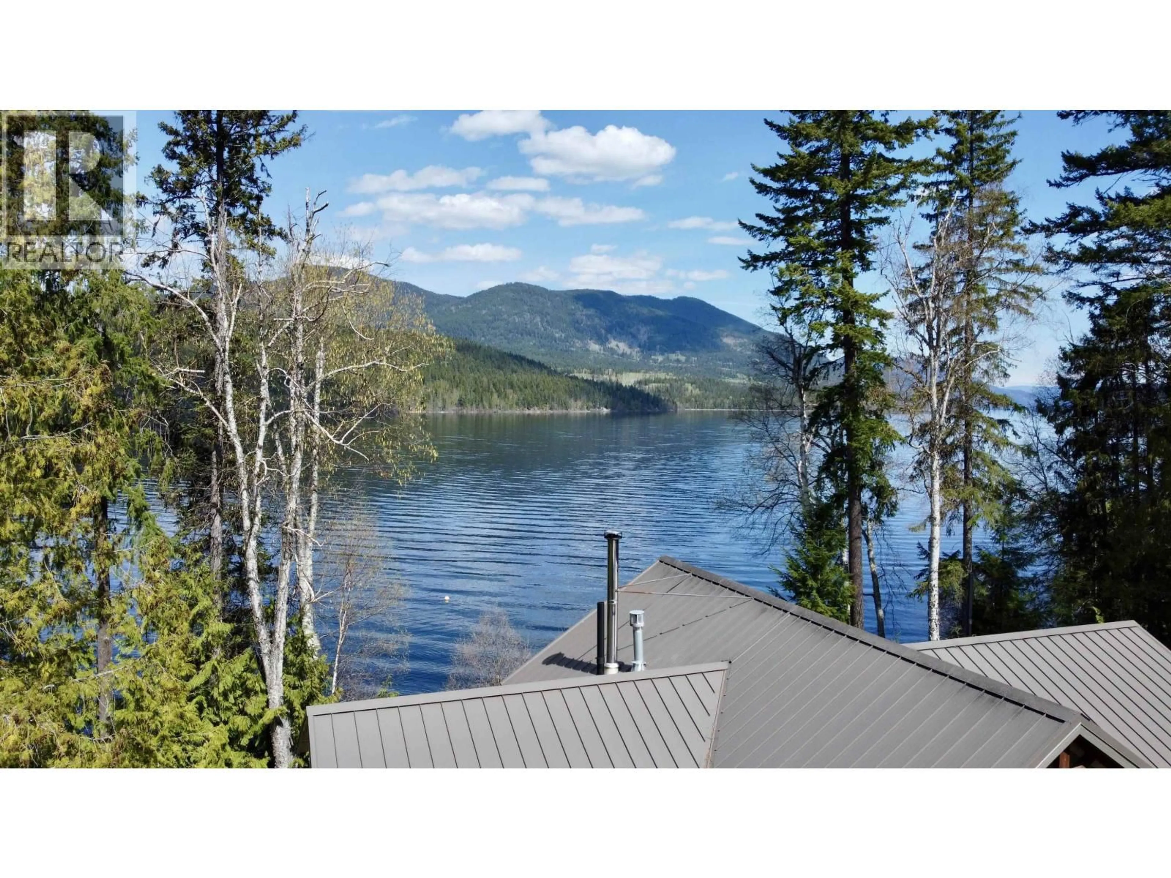 A pic from outside/outdoor area/front of a property/back of a property/a pic from drone, water/lake/river/ocean view for 8989 MAHOOD LAKE ROAD, Canim Lake British Columbia V0K1J0